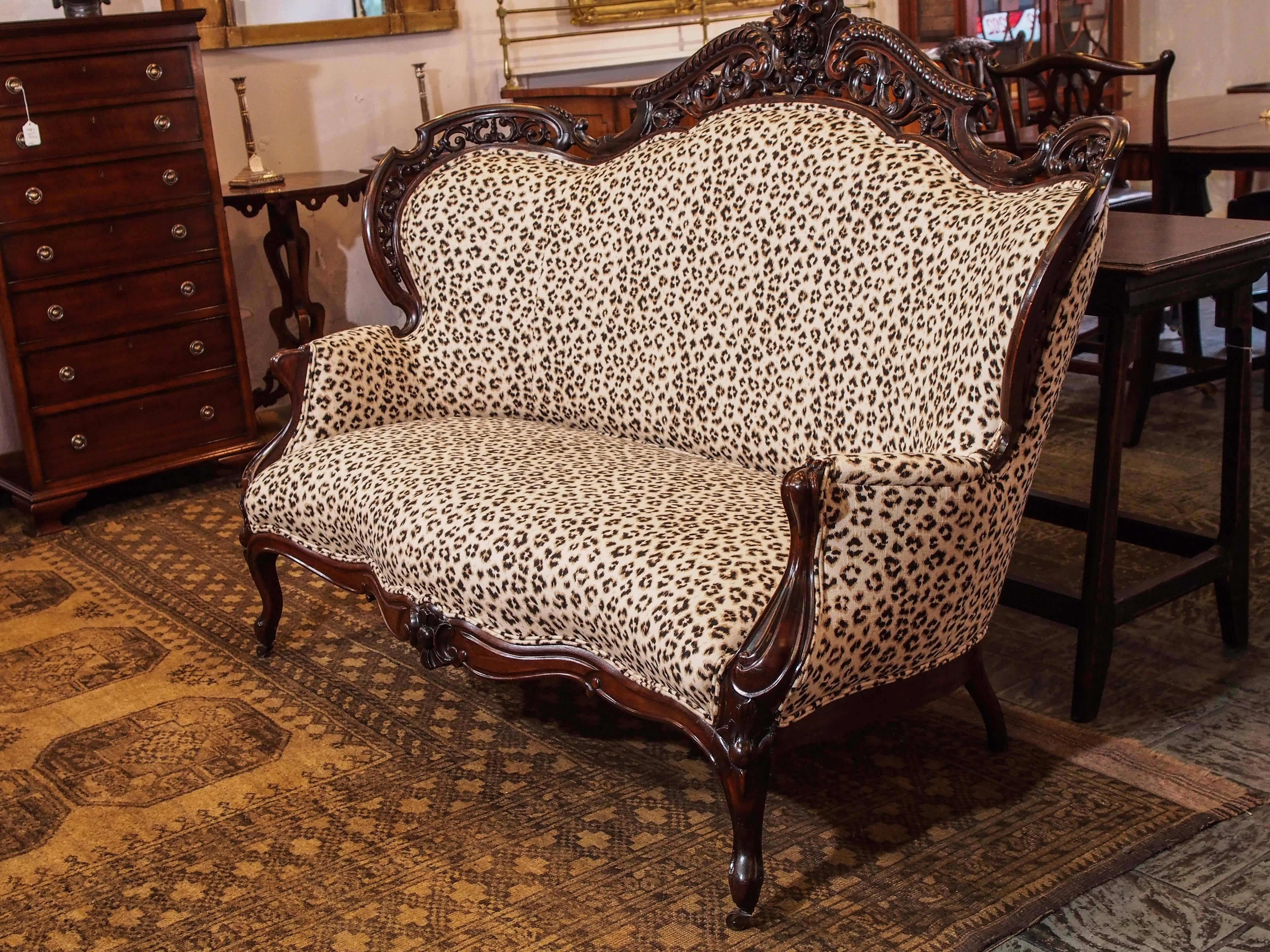 Antique American Victorian mahogany sofa. By John Meeks.