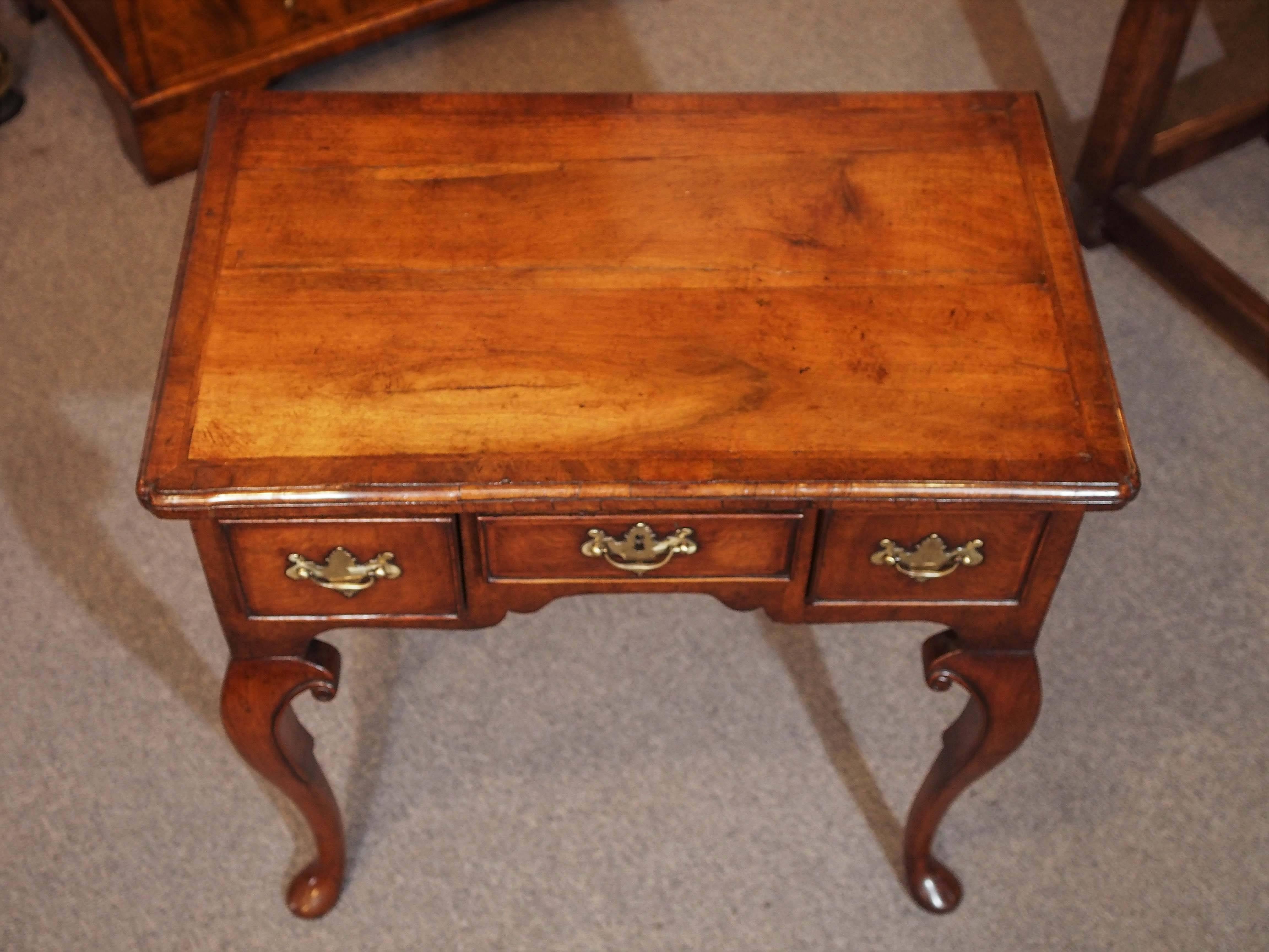 Early 18th century walnut lowboy, George I.