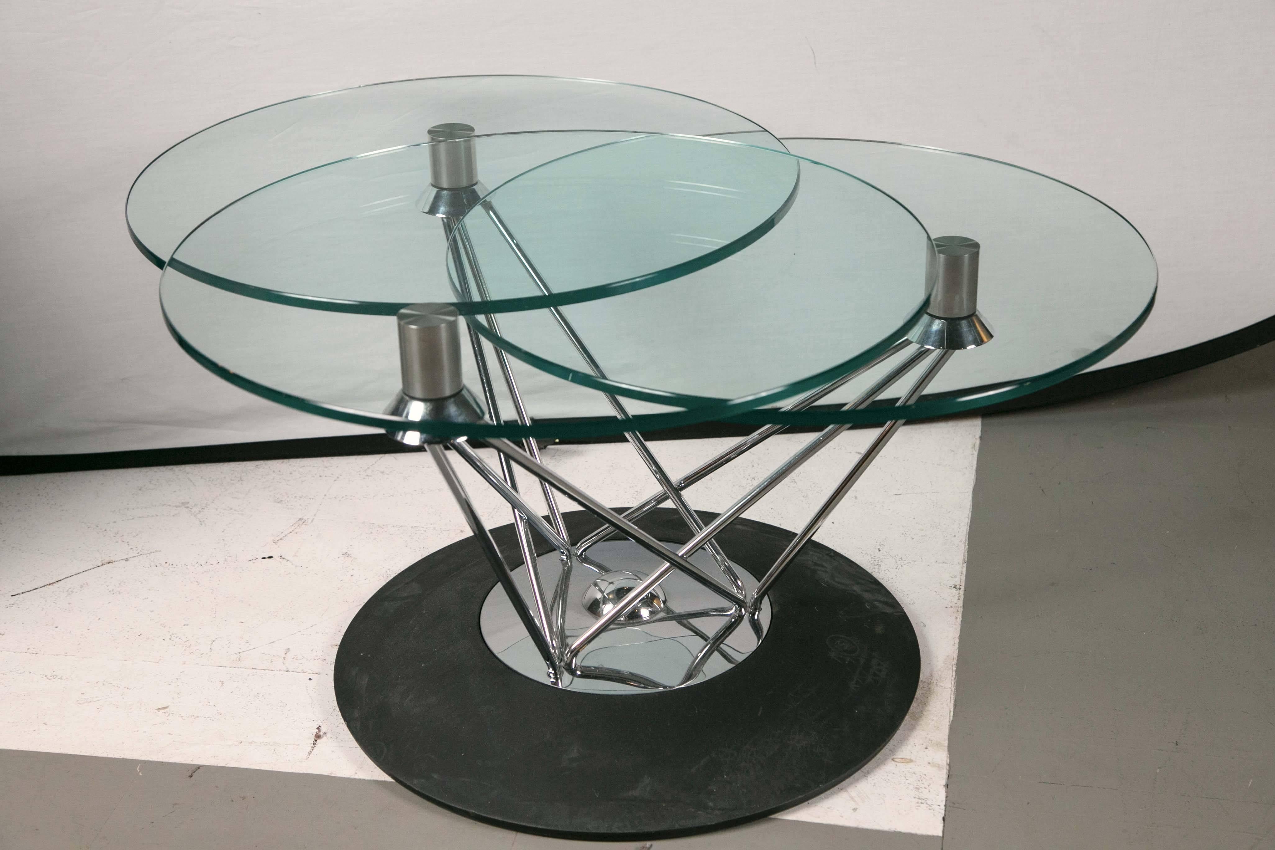 Mid-Century Italian swivel coffee table chrome glass with matte black weighted base.