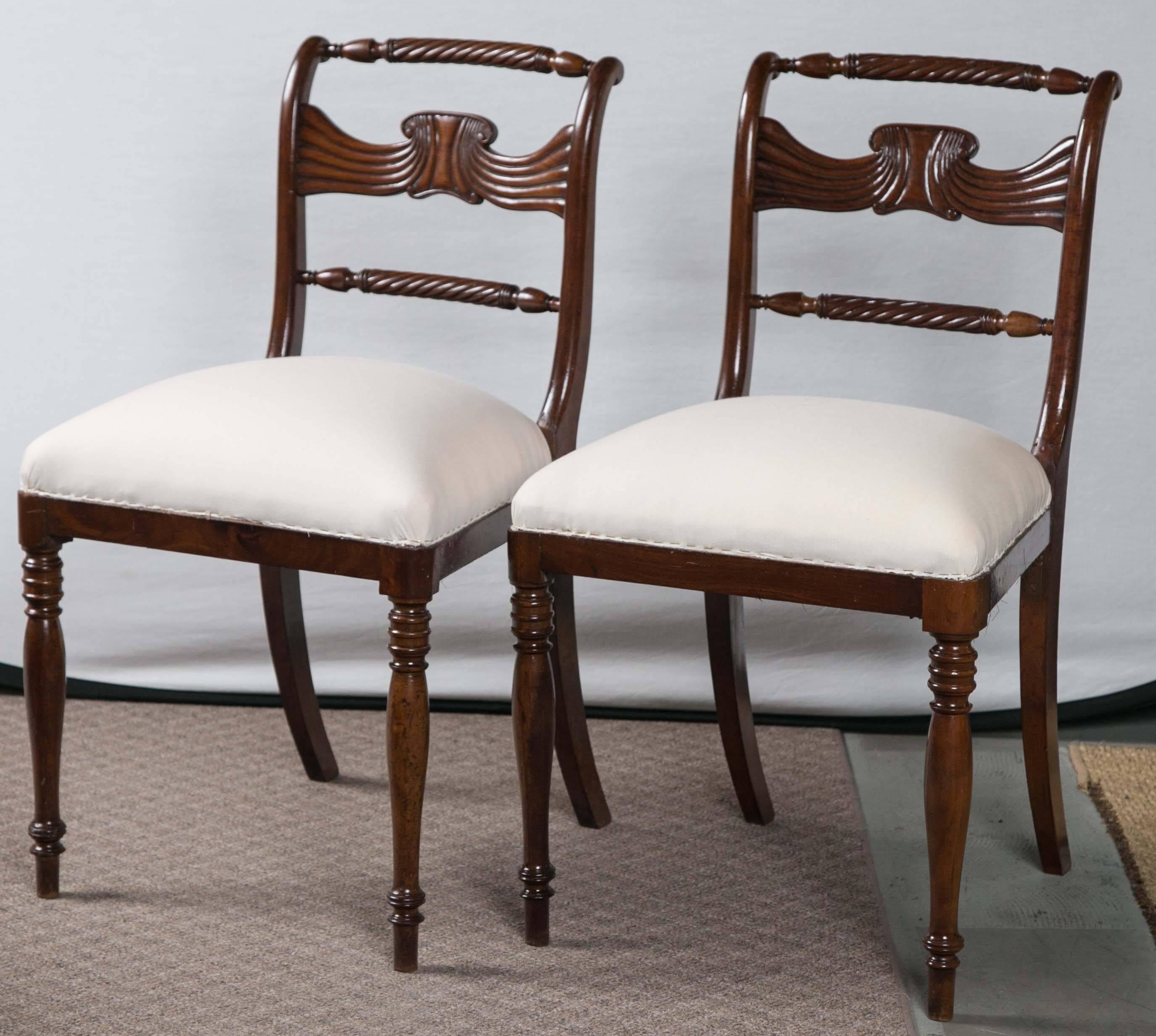 Beautifully carved and finished set of six 19th century Federal dining chairs recently covered in muslin.