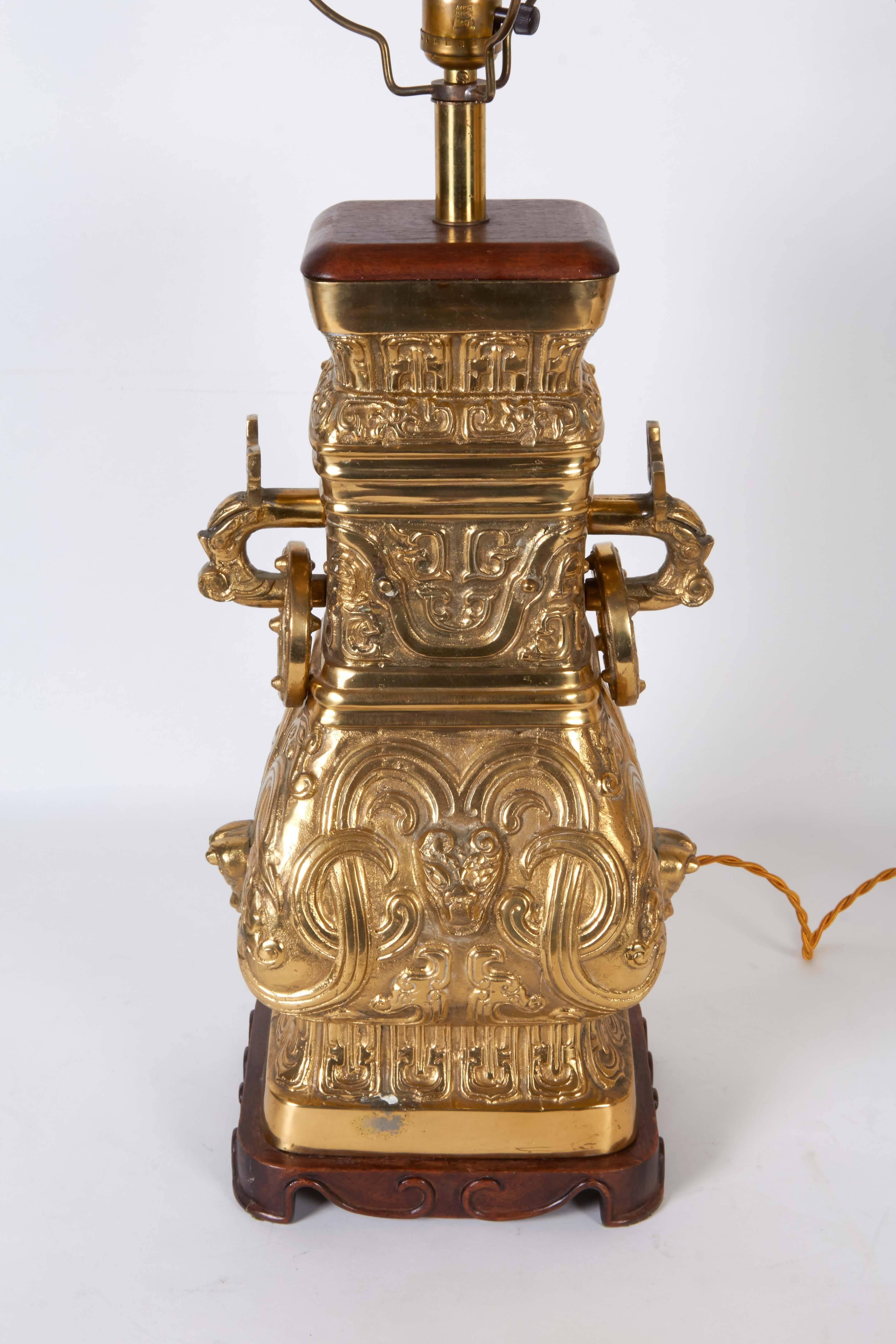 Hong Kong Pair of Archaic Chinese Vase Form Lamps in the Manner of James Mont