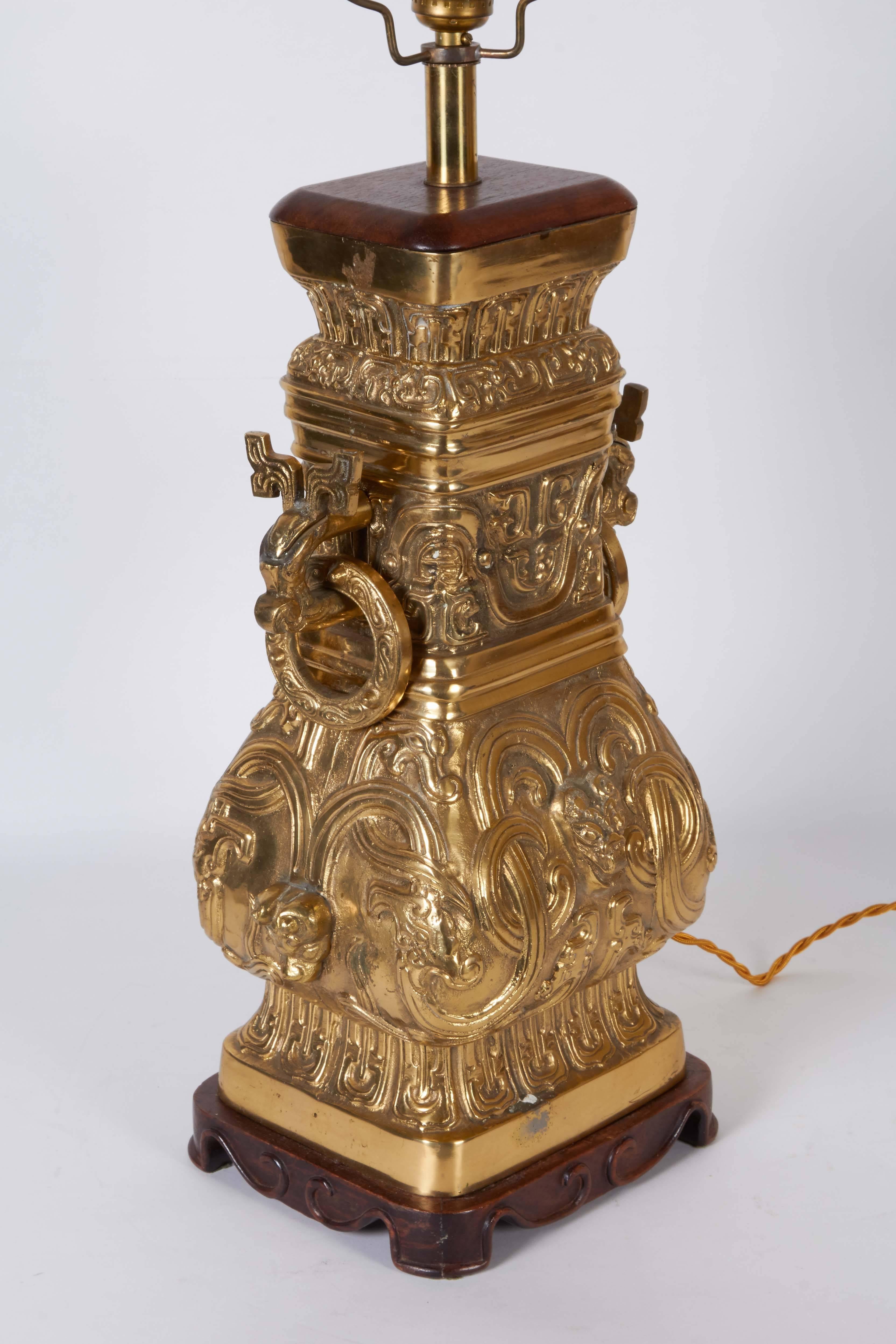 Pair of Archaic Chinese Vase Form Lamps in the Manner of James Mont 1