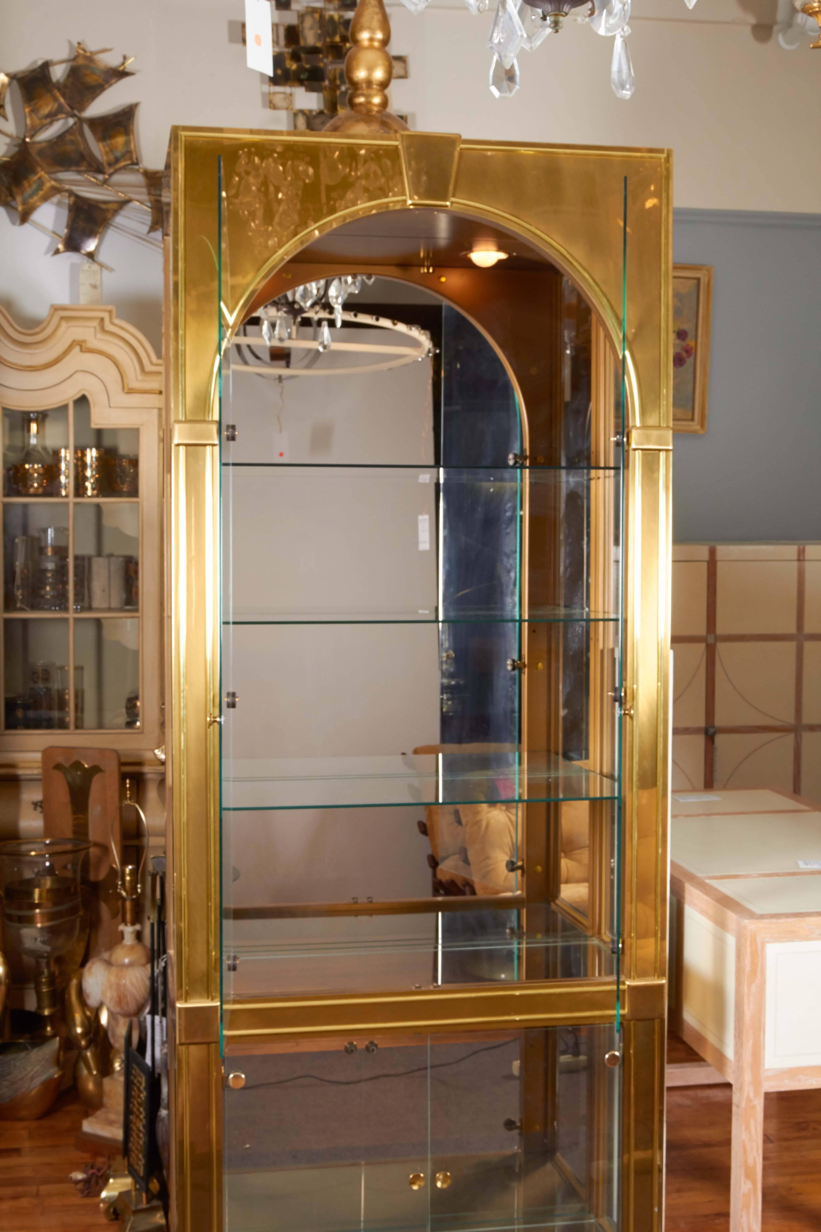 Glass Pair of Mastercraft Palladian Style Vitrines in Brass
