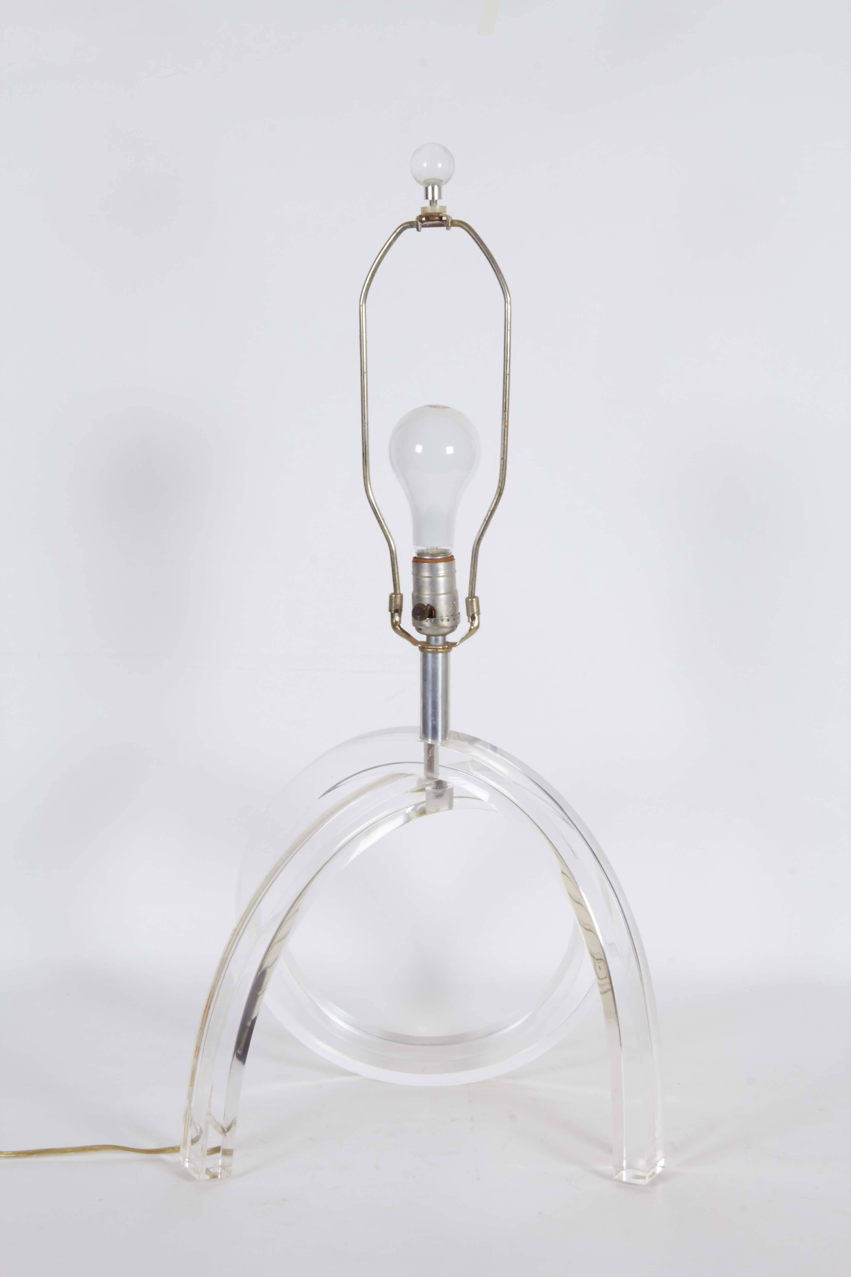 A modern style, circa 1970s table lamp by designer Dorothy Thorpe, single socket on sculptural 'pretzel' form Lucite base; includes matching ball finial. Very good vintage condition, wear consistent with age and use.

10850