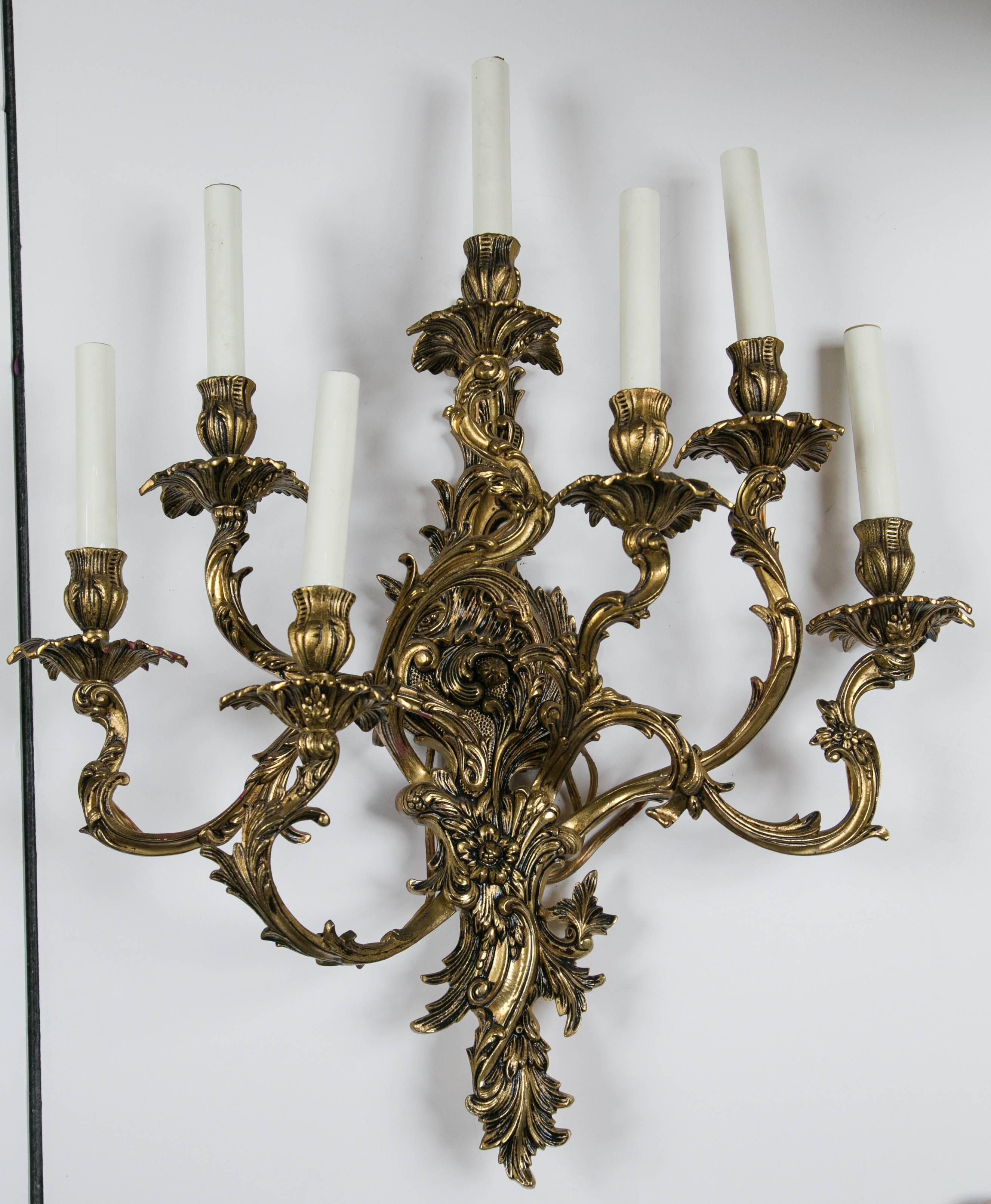This pair has six electrified arms plus one light at the top.
 They are in the elaborate style of Louis XV Rococo and in excellent condition. They have been lacquered.