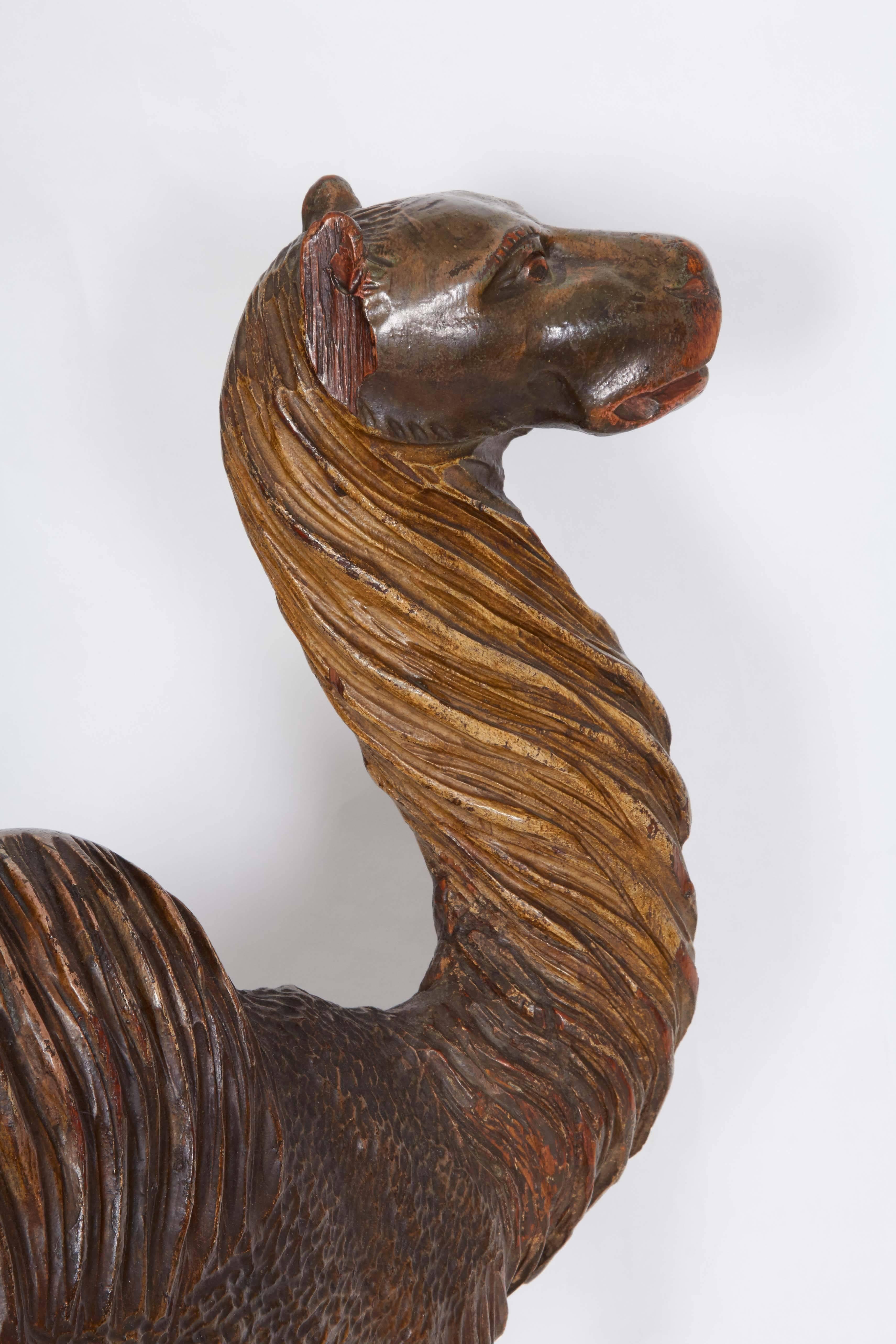 Early 20th Century Late 19th Century Carved Wooden Camel on Stand