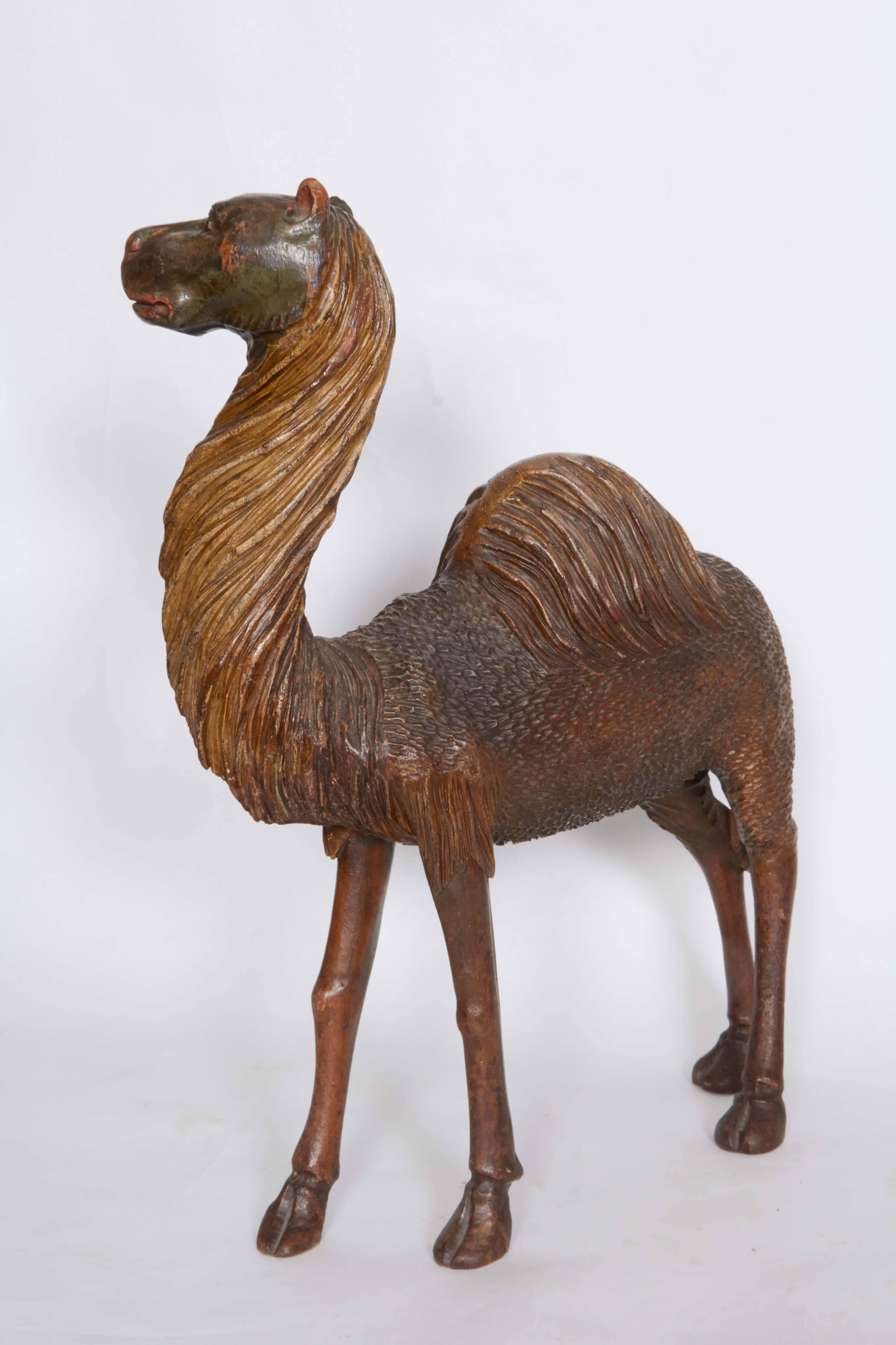 Late 19th Century Carved Wooden Camel on Stand 1