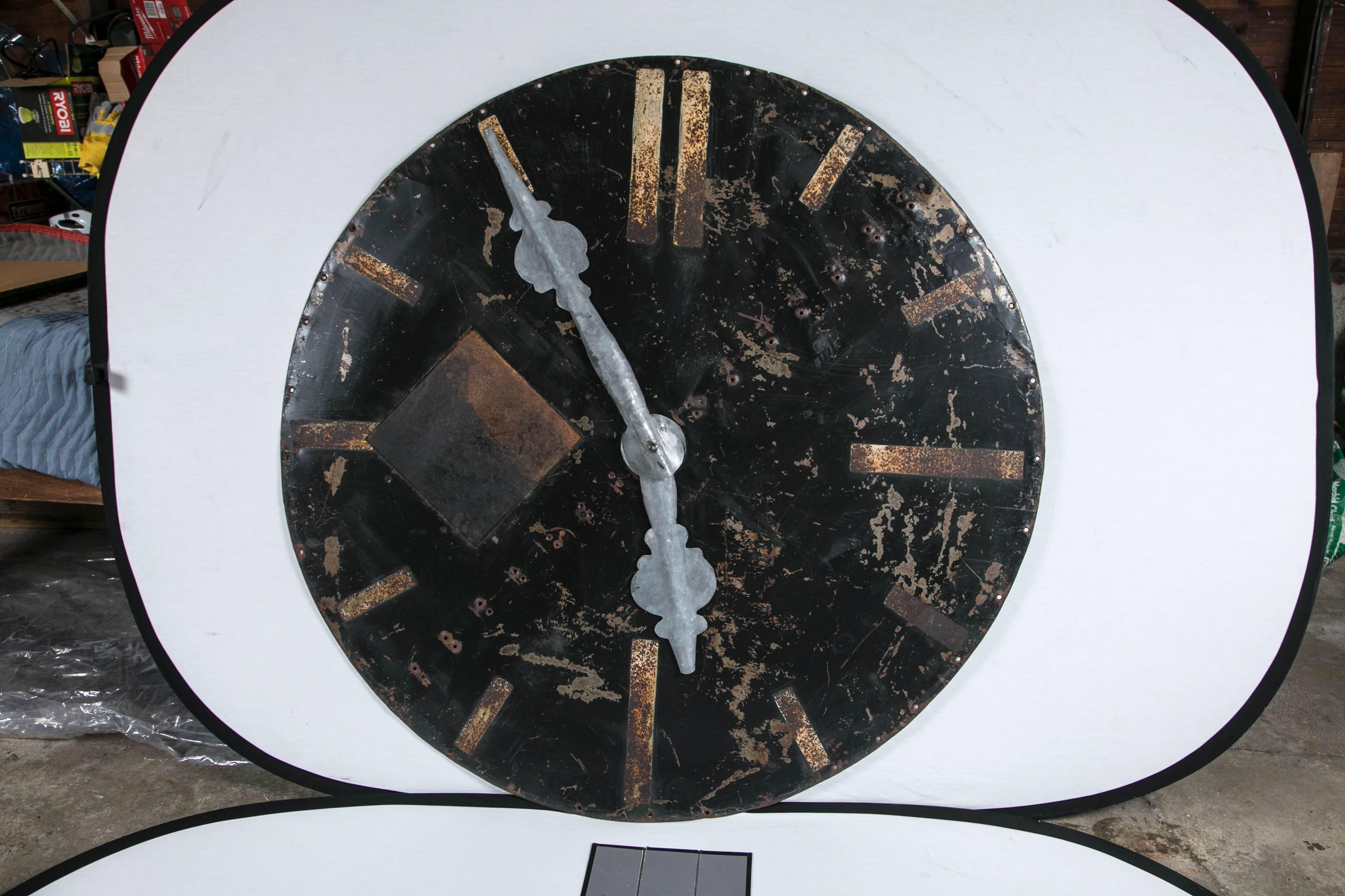 Graphic painted metal architectural clock face with zinc hands from France, circa 1920s.
