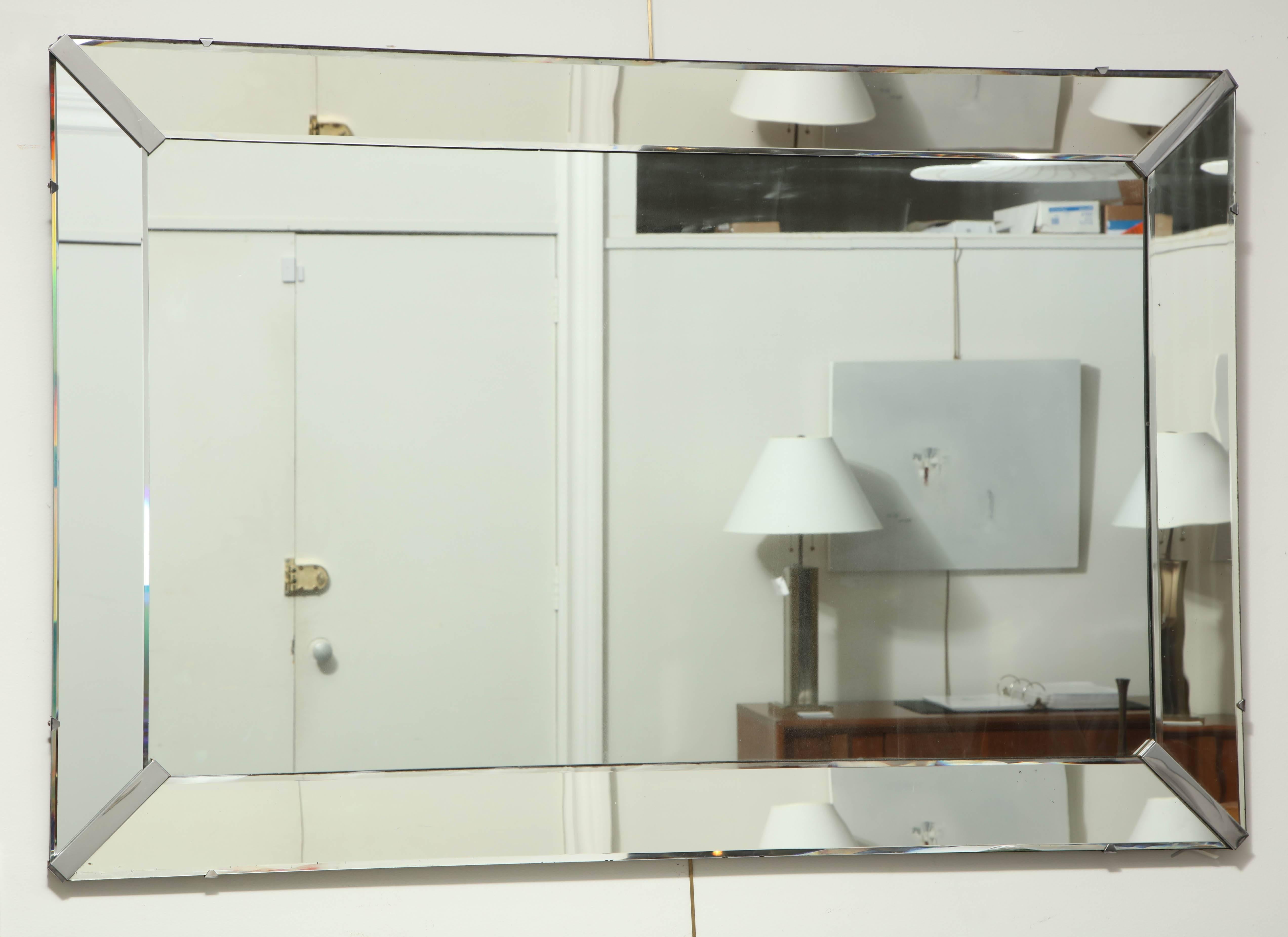 20th century Venetian mirror, rectangular plate within mirror border, corner mirrored clasps.