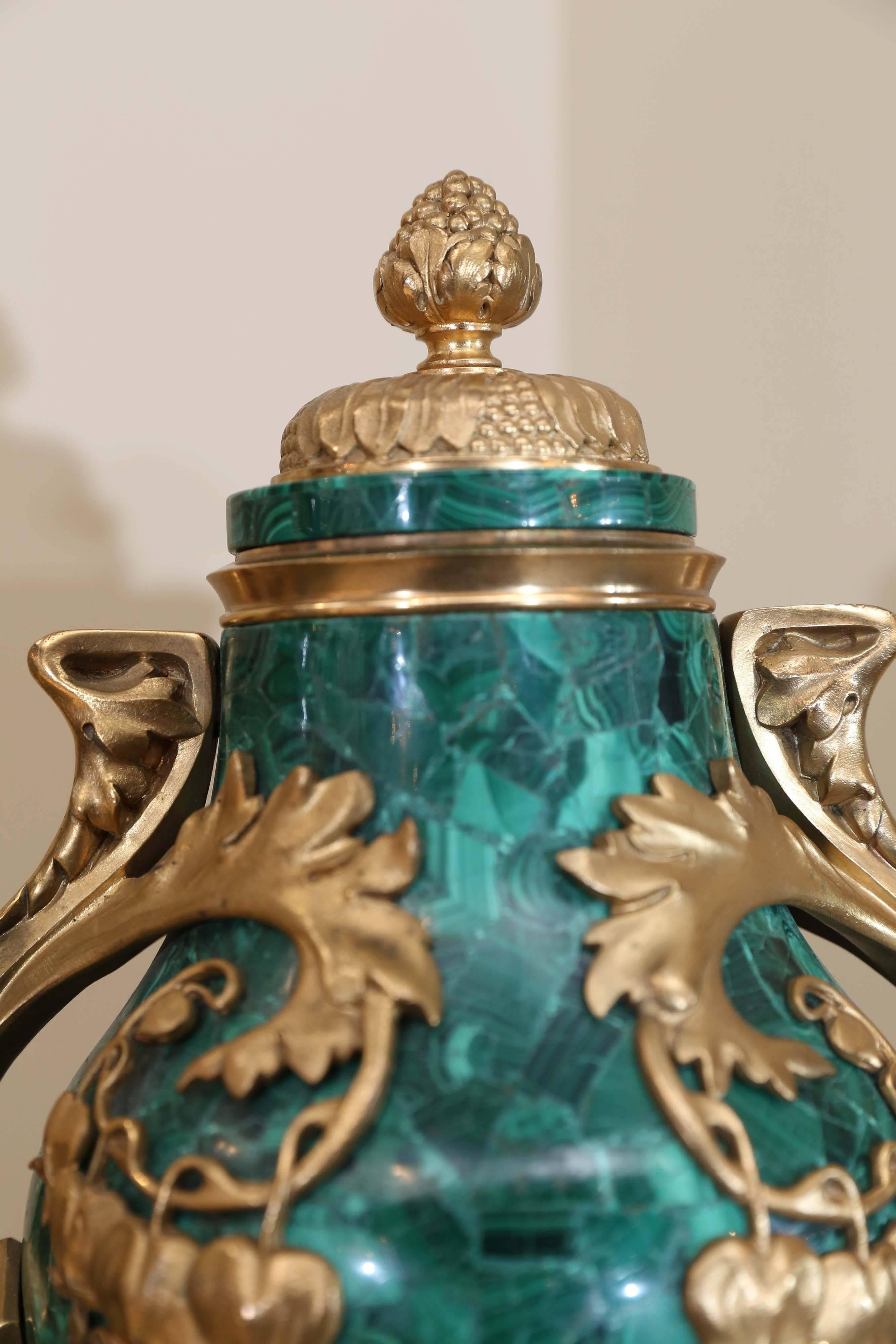 Art Nouveau Pair of Russian Malachite Capped Urns in the Nouveau Style with Ormolu Mounts