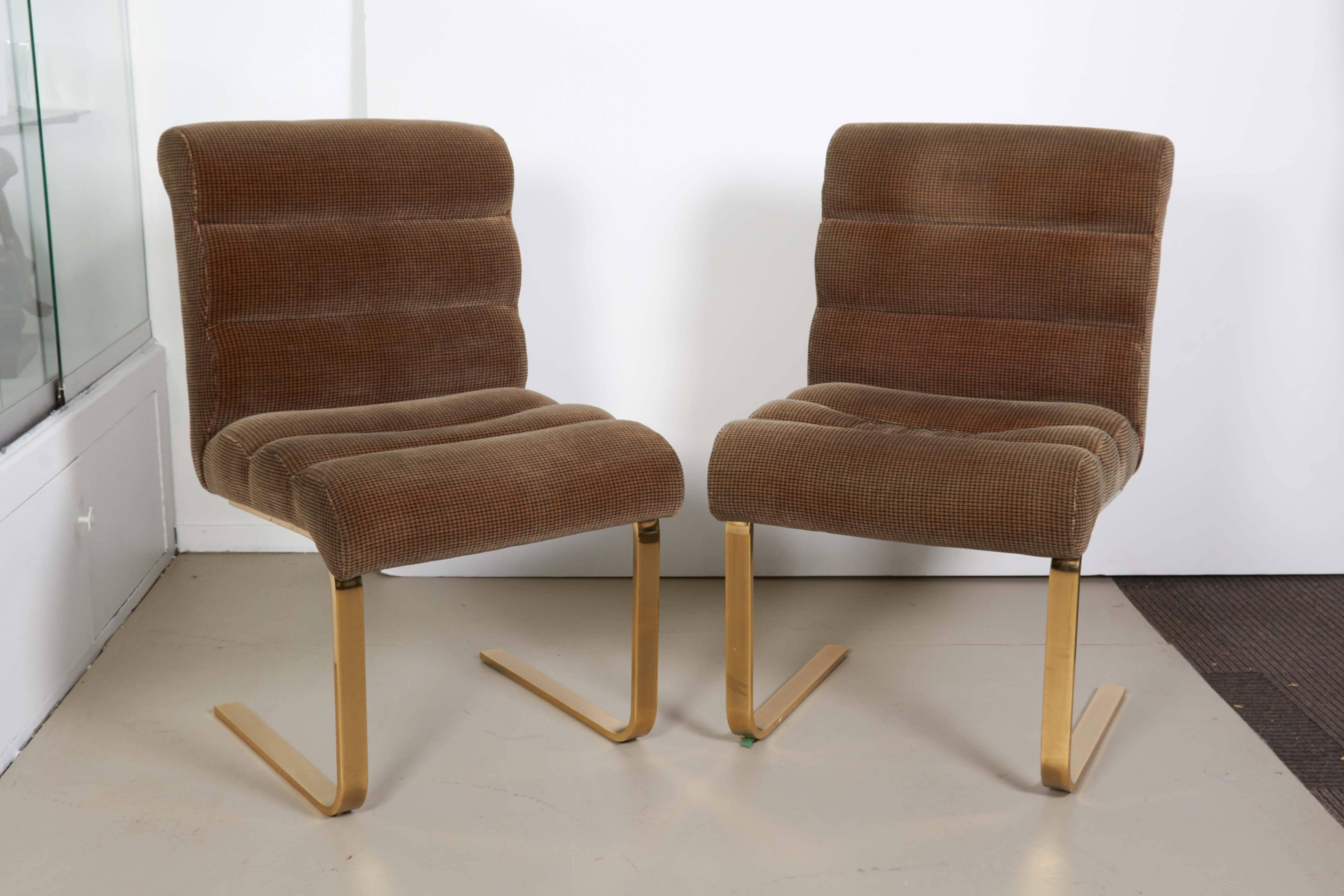 A set of six 'Lugano' dining chairs by designer Frank Mariani, manufactured by the Pace Collection, circa 1970s, upholstered backs and seats on cantilever bases in antiqued brass. Very good vintage condition, consistent with age and use; requires