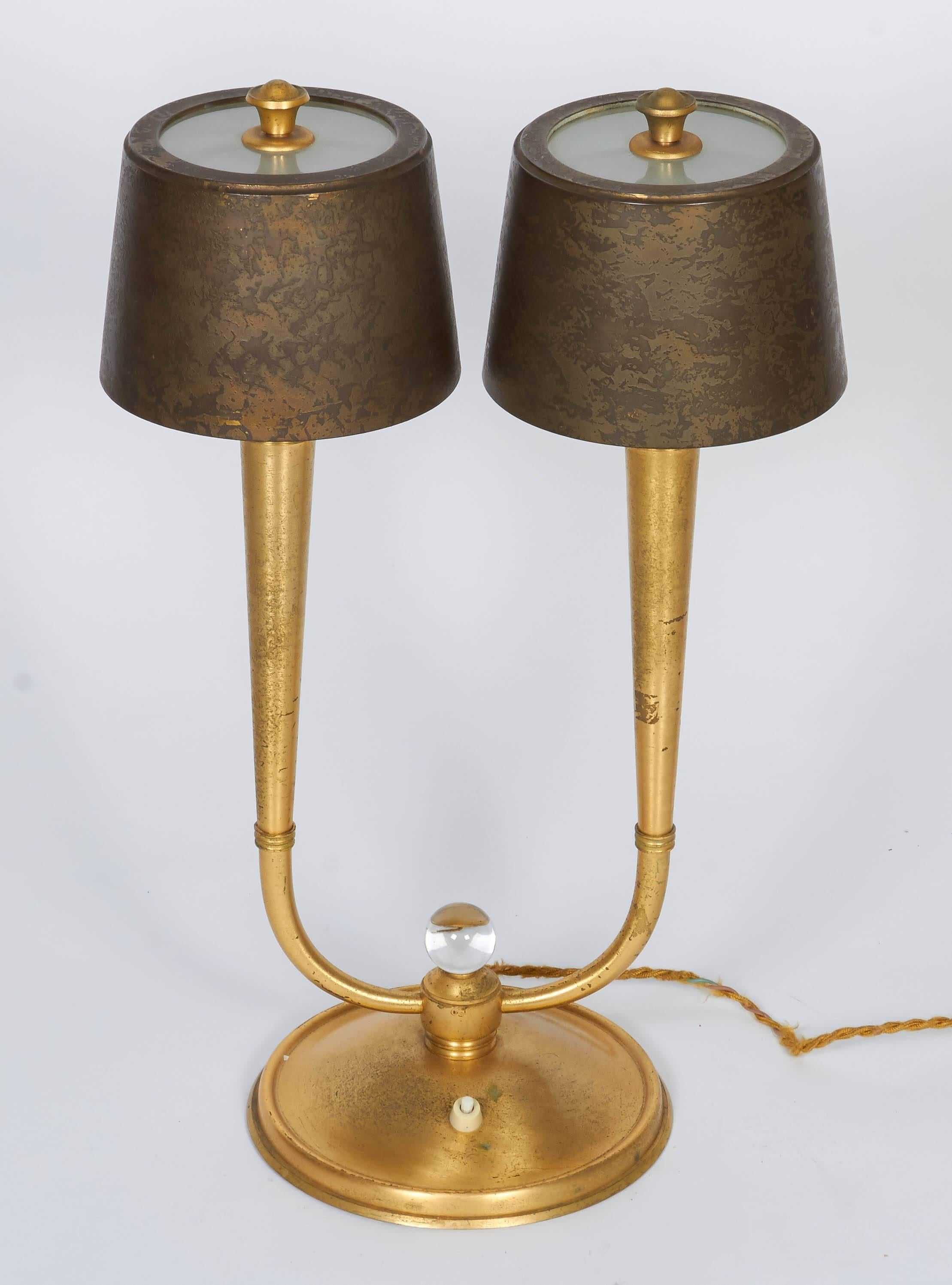 Pair of Table Lamps by Gent et Michon in cast gilded bronze.
Measures: Height: 20.5