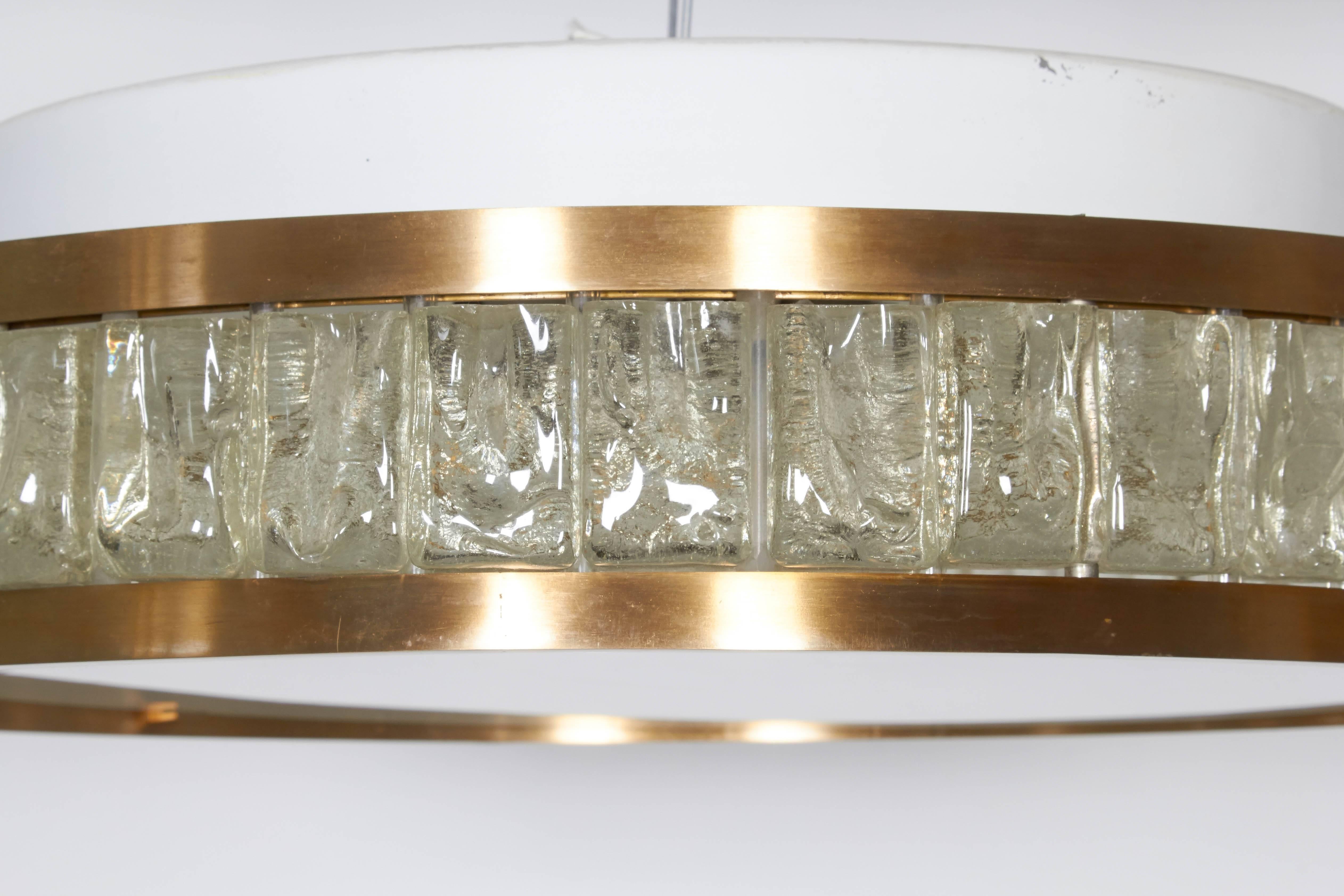 Perzel ceiling fixture made of brass and glass segments, the bottom in white milky glass. There are four sockets inside.