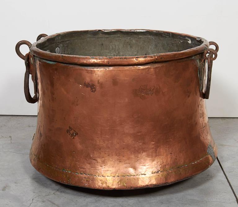 Large Antique Copper Kettle with Flared Base and Heavy Iron Handles For