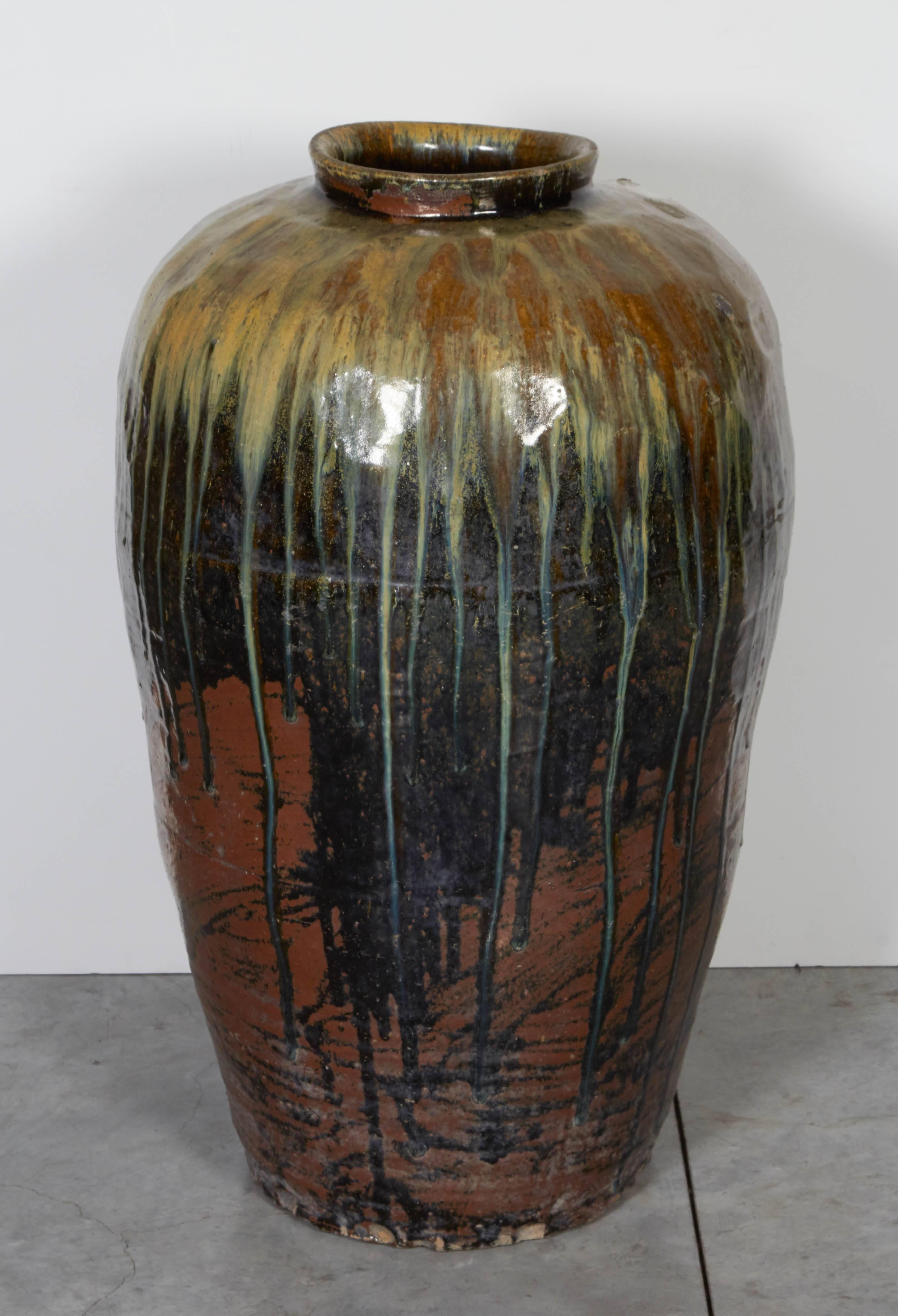 A very tall, multi-color antique Chinese ceramic jar from Shanxi Province. Beautifully glazed and gracefully shaped.
CR713.