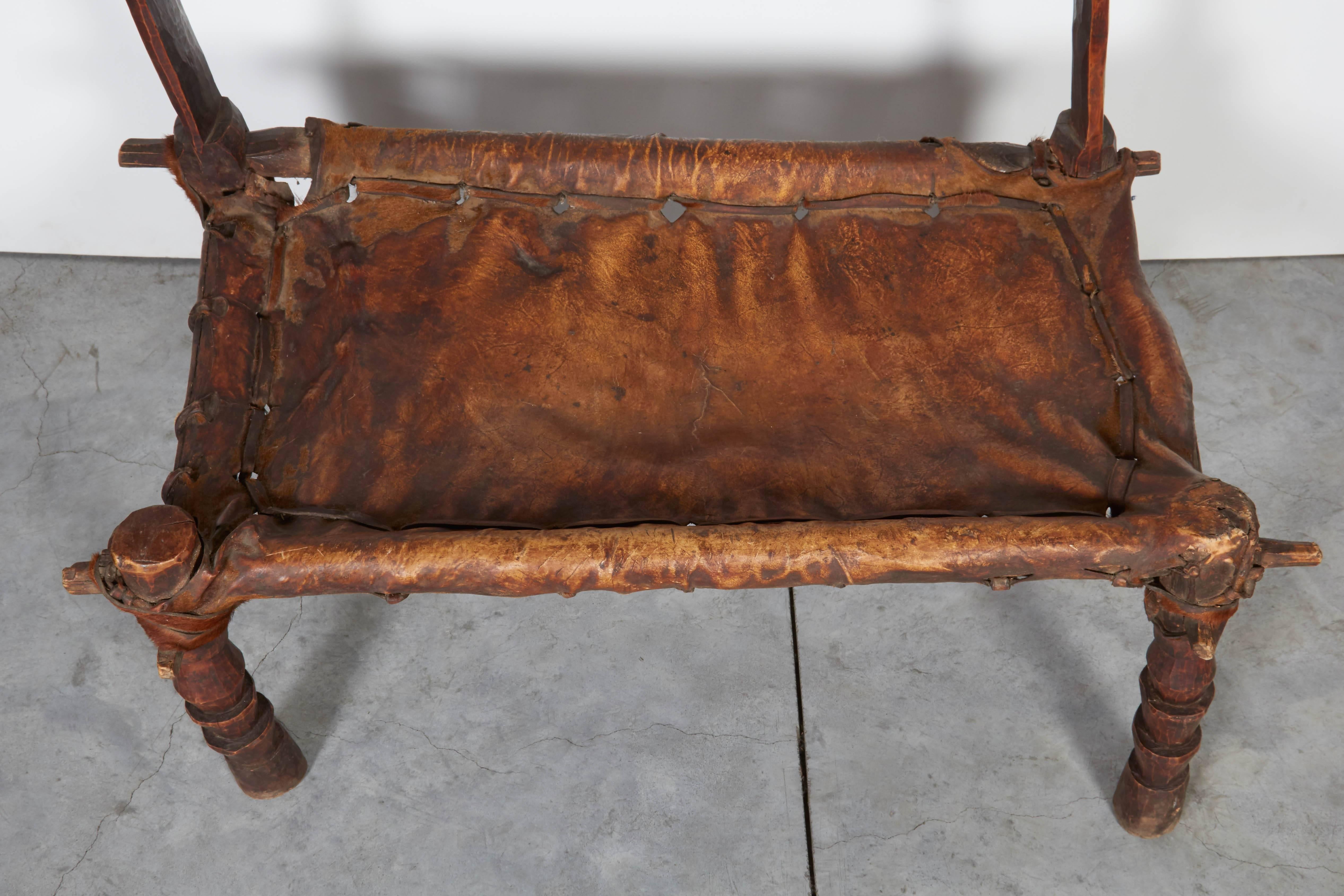 Ethiopian Rustic Antique Wood and Leather Bench with Great Patina and Character For Sale