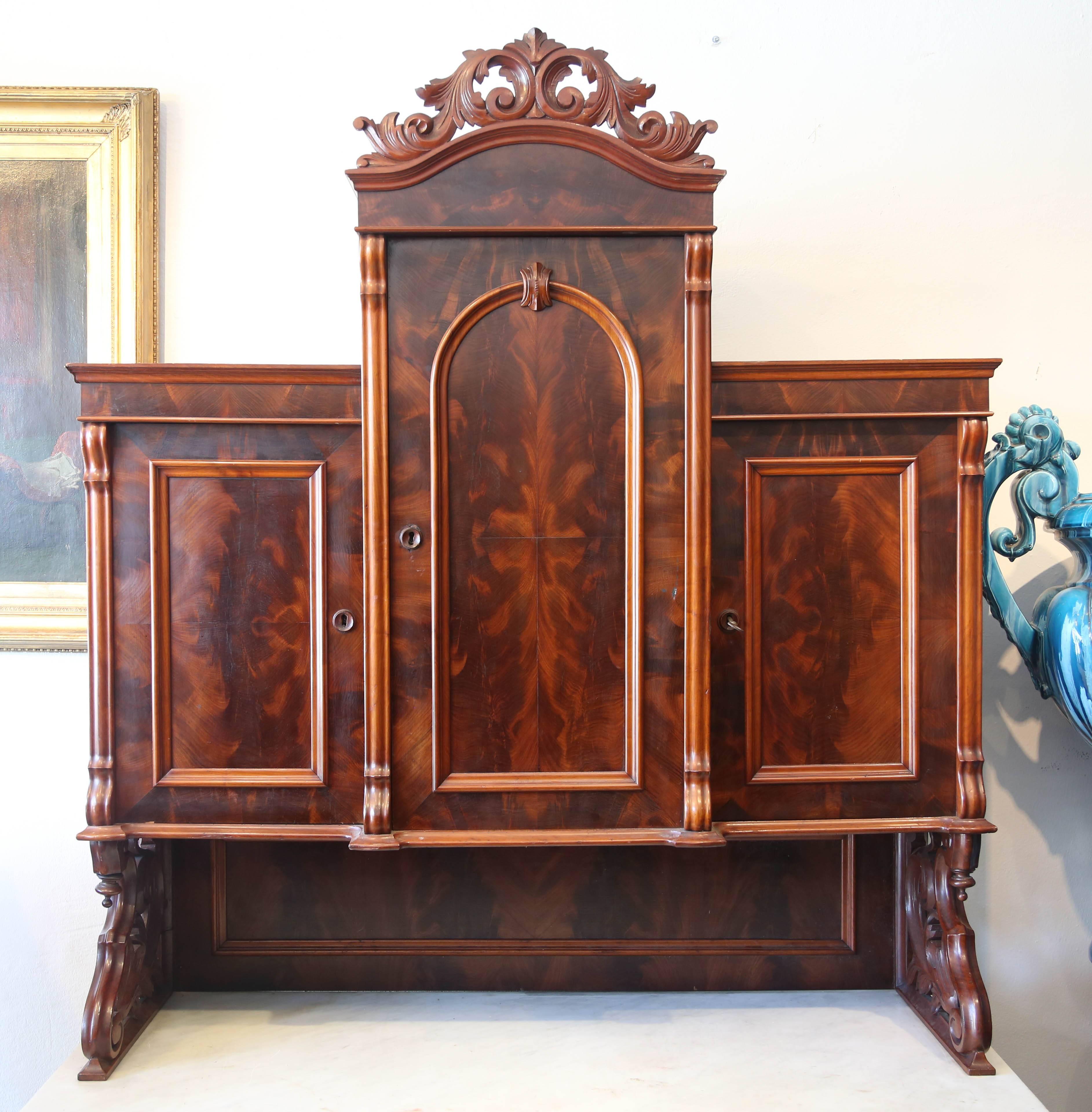 This is a superb mahogany buffet but would be great as a bar.
It has the original patina which is flamed mahogany; brass handles with the original serpentine front marble, which is great for serving drinks.
Inside its very clean it has been looked