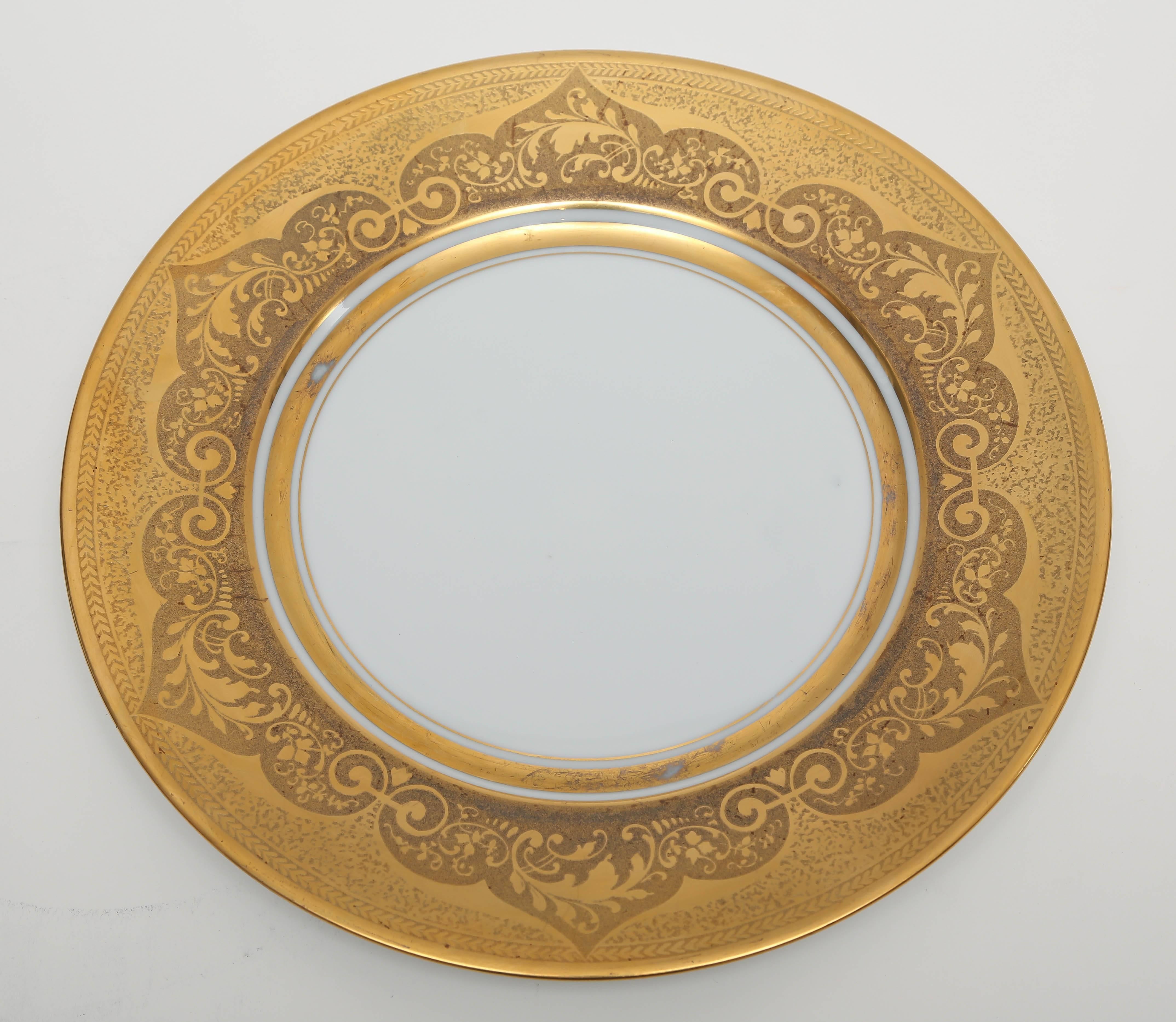 A lovely combined service with fine porcelain blanks by Bavarian and Czech makers and superb gilt decoration by Pickard. circa 1920 before Pickard started producing their own china to decorate on.
12 dinner plates measuring 10.75