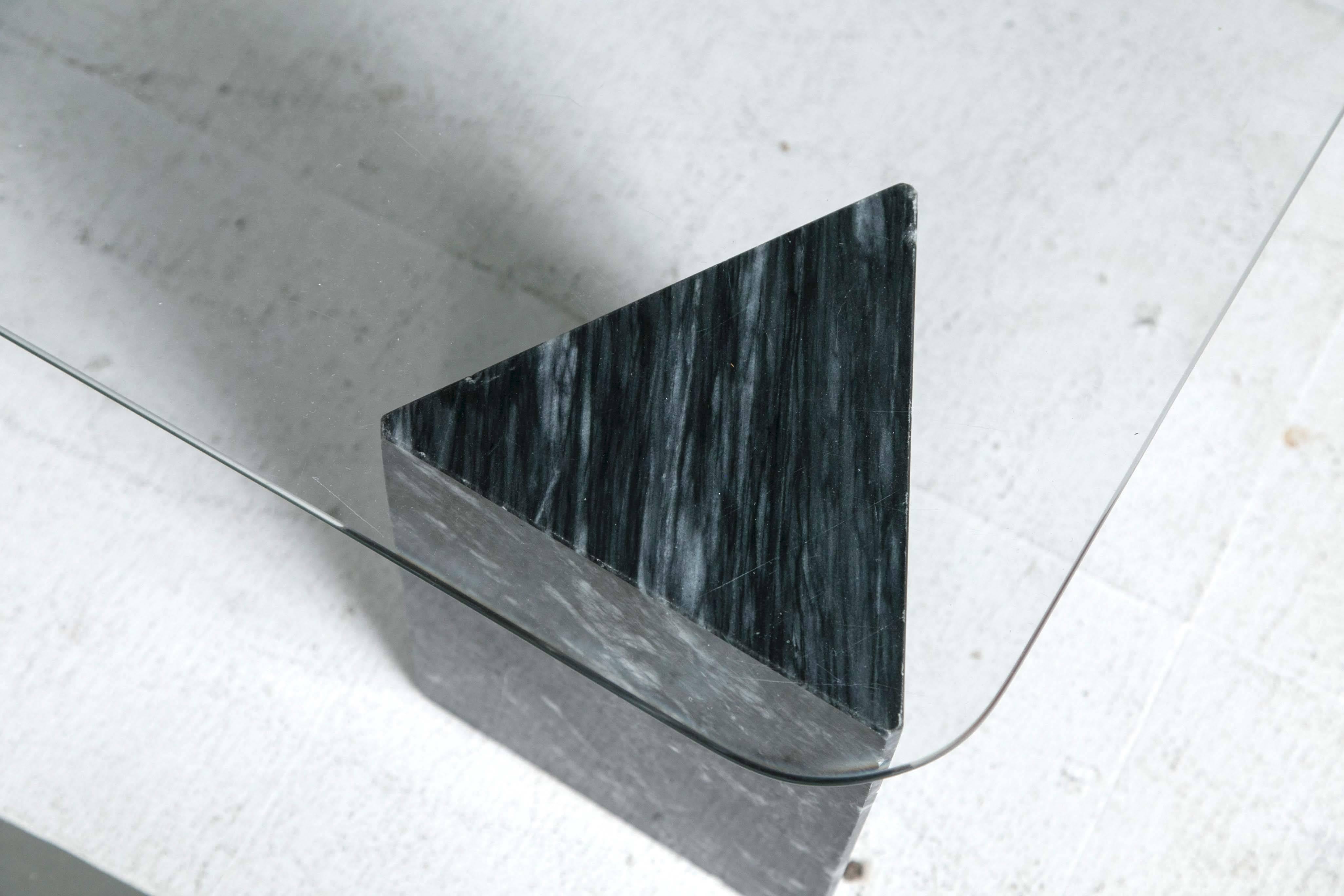 glass table with marble base