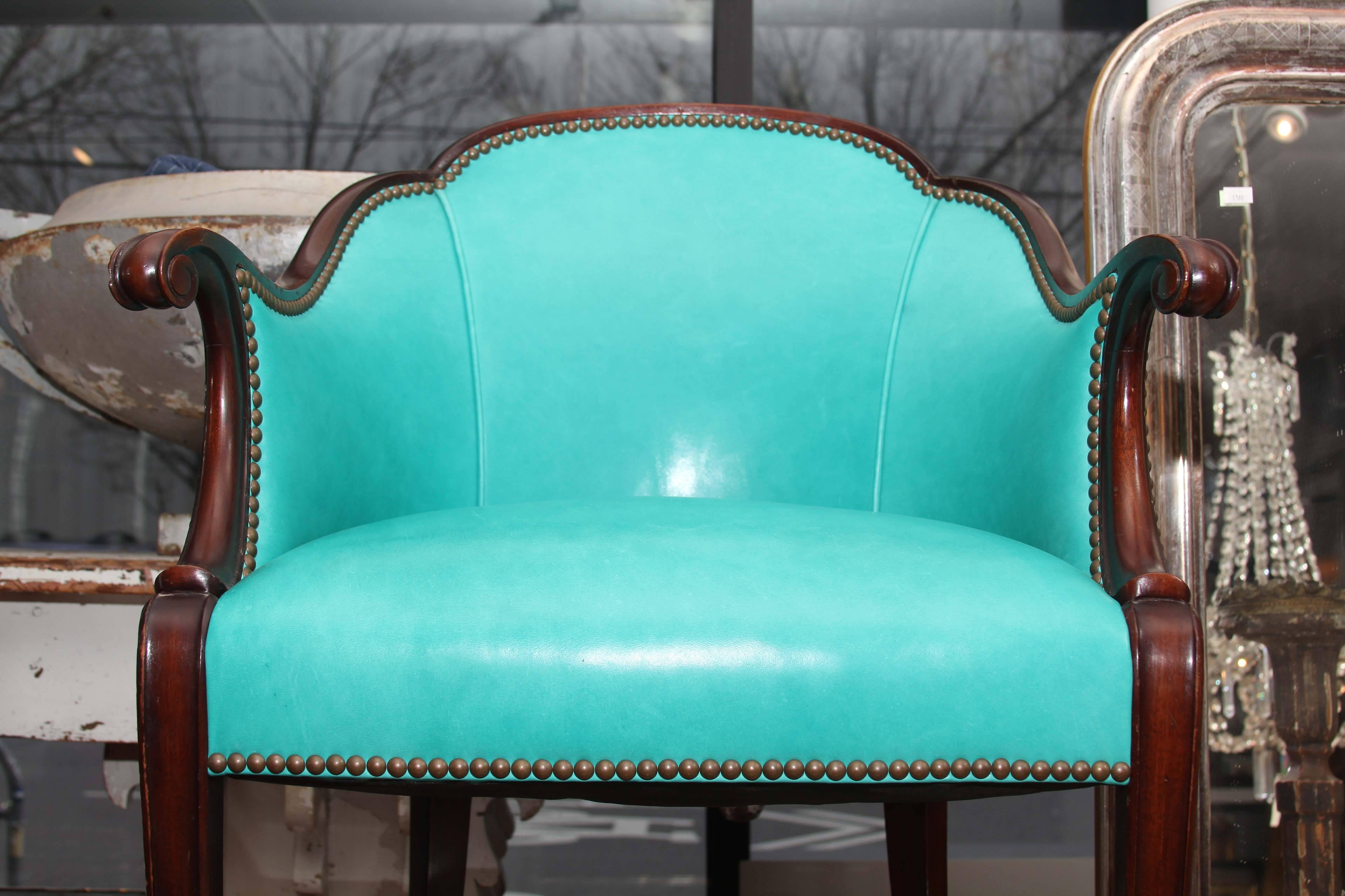Antique English side chair newly upholstered in peacock leather with nail head trim.
