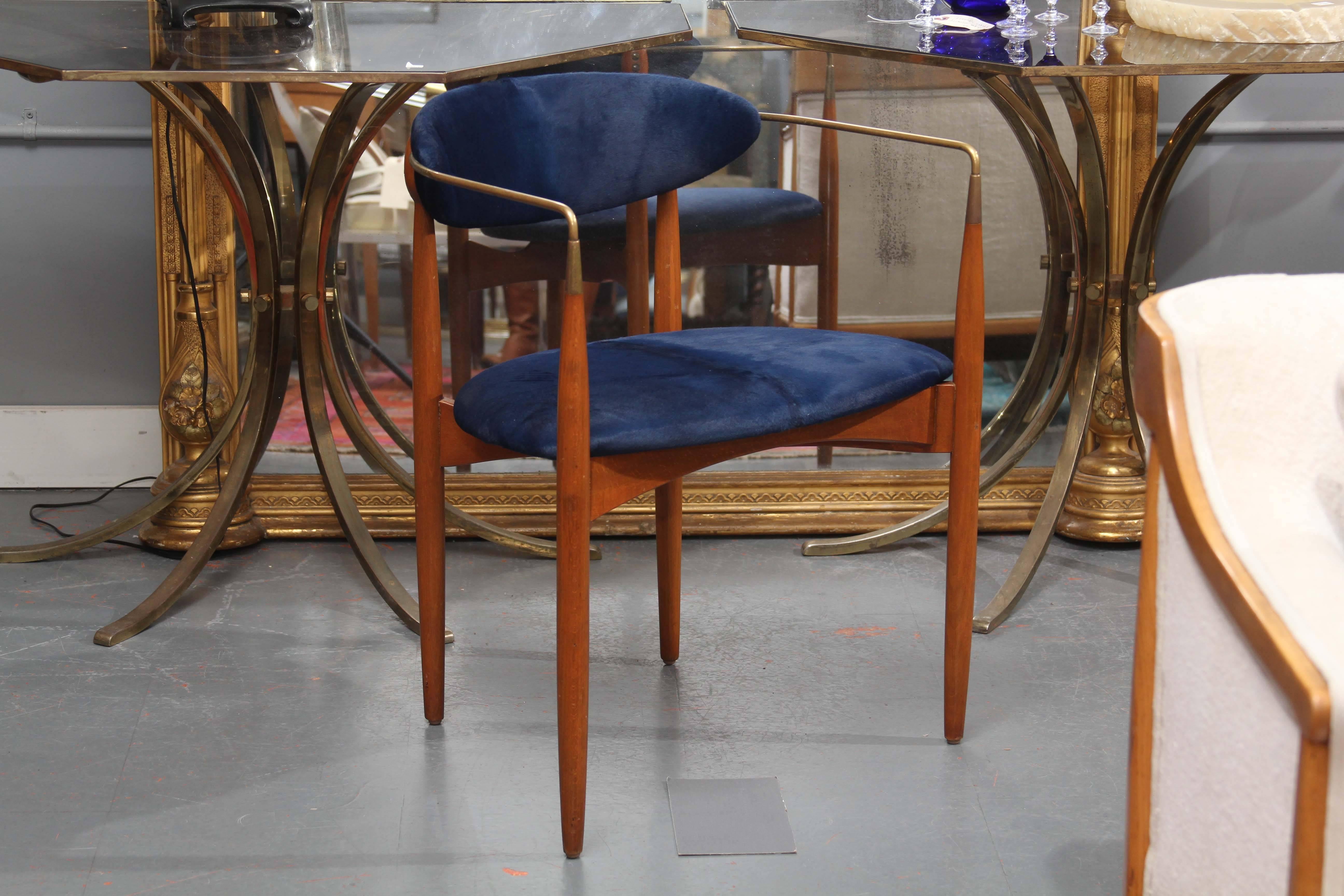 Great lines on this side chair. Glossy deep blue hide upholstery.