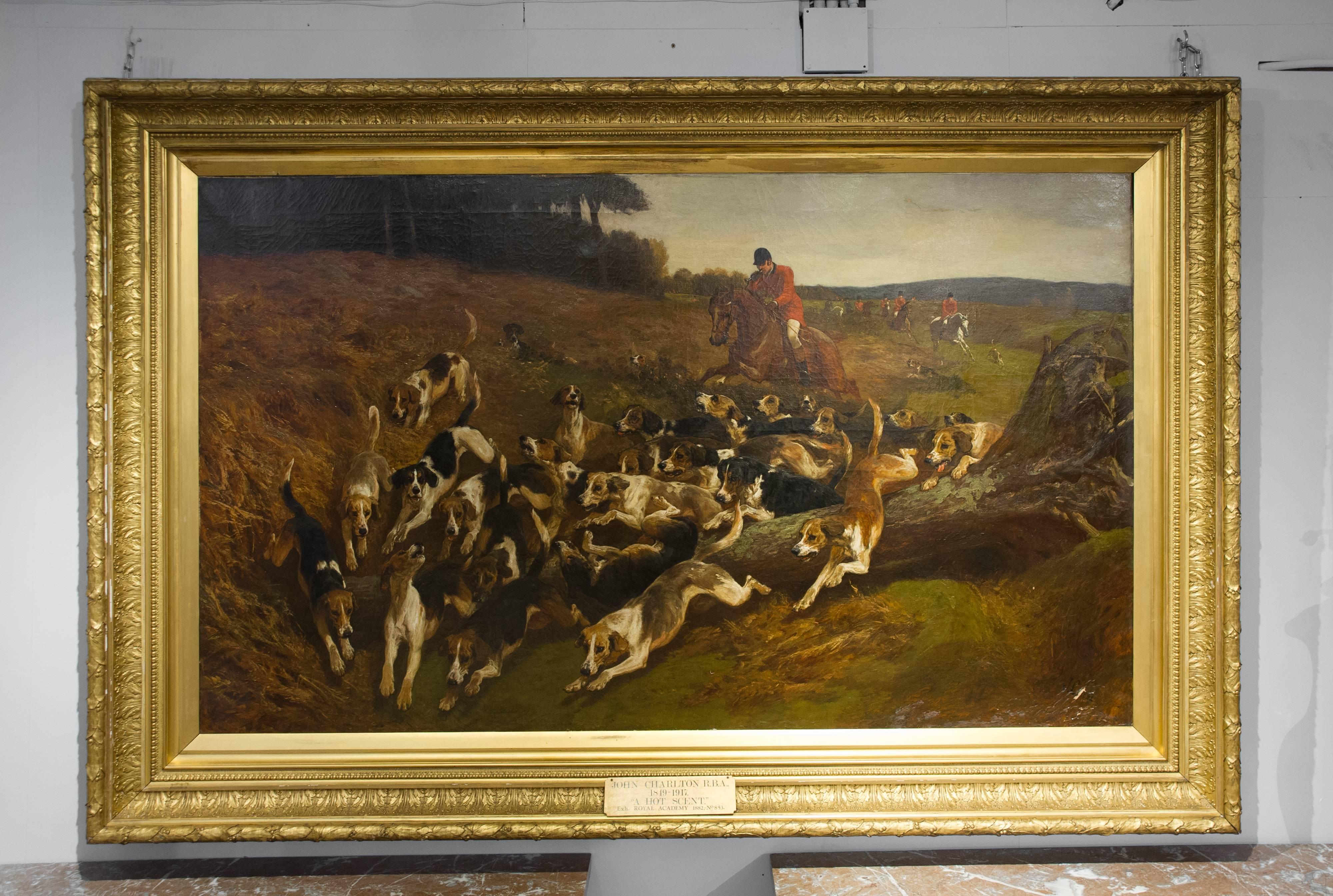 This particular painting is titled ‘A Hot Scent’ and was done in 1882 for exhibit at the Royal Academy, depicting a fox hunting scene with the signature of the artist in the lower right hand corner. This immense and outstanding work is framed in the