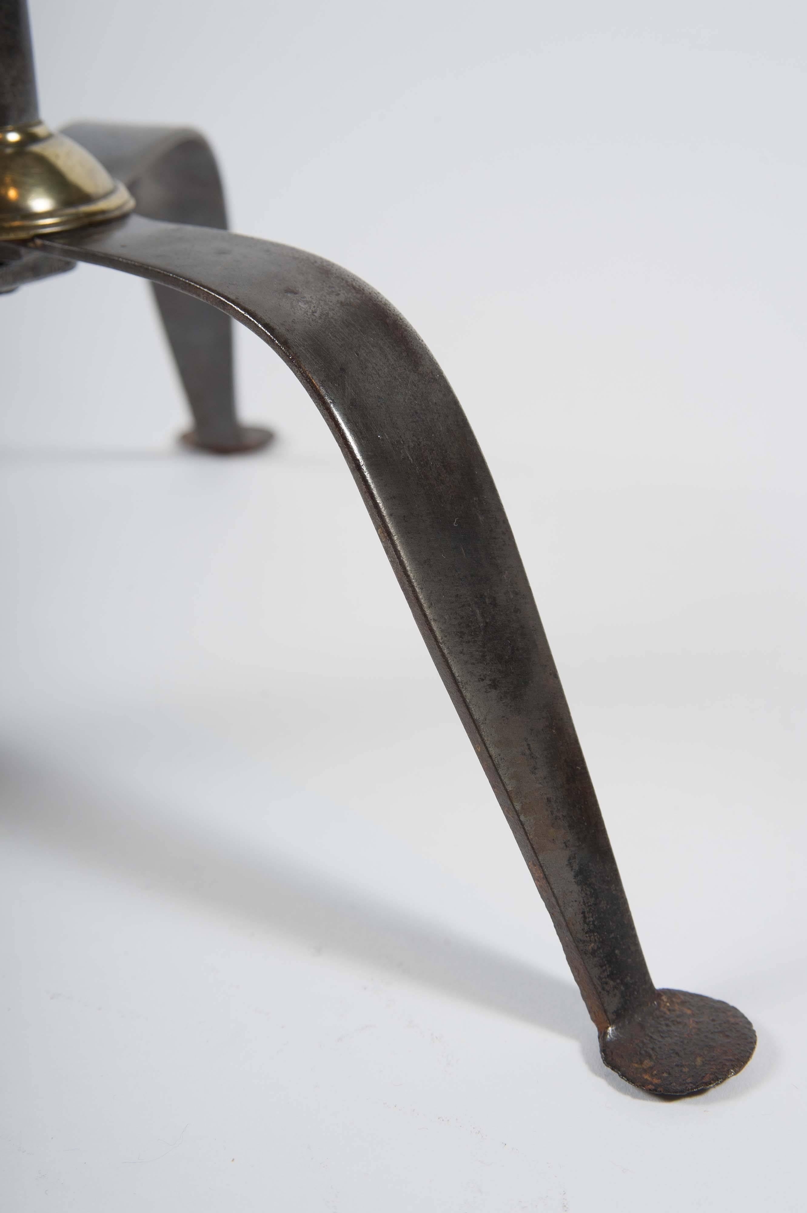 Brass George III Period Steel Trivet with Turned “Vase” Stem and Pierced Circular Top For Sale
