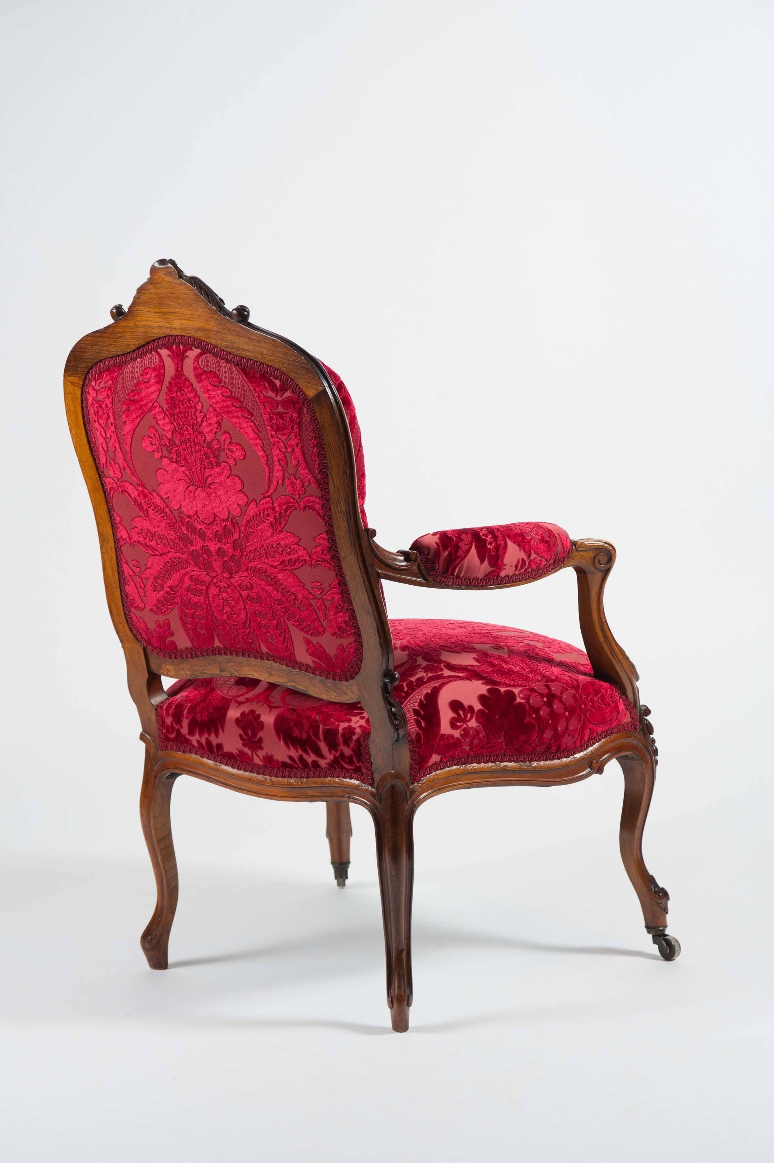 English Mid-19th Century Carved Rosewood Open Armchair in the French Style