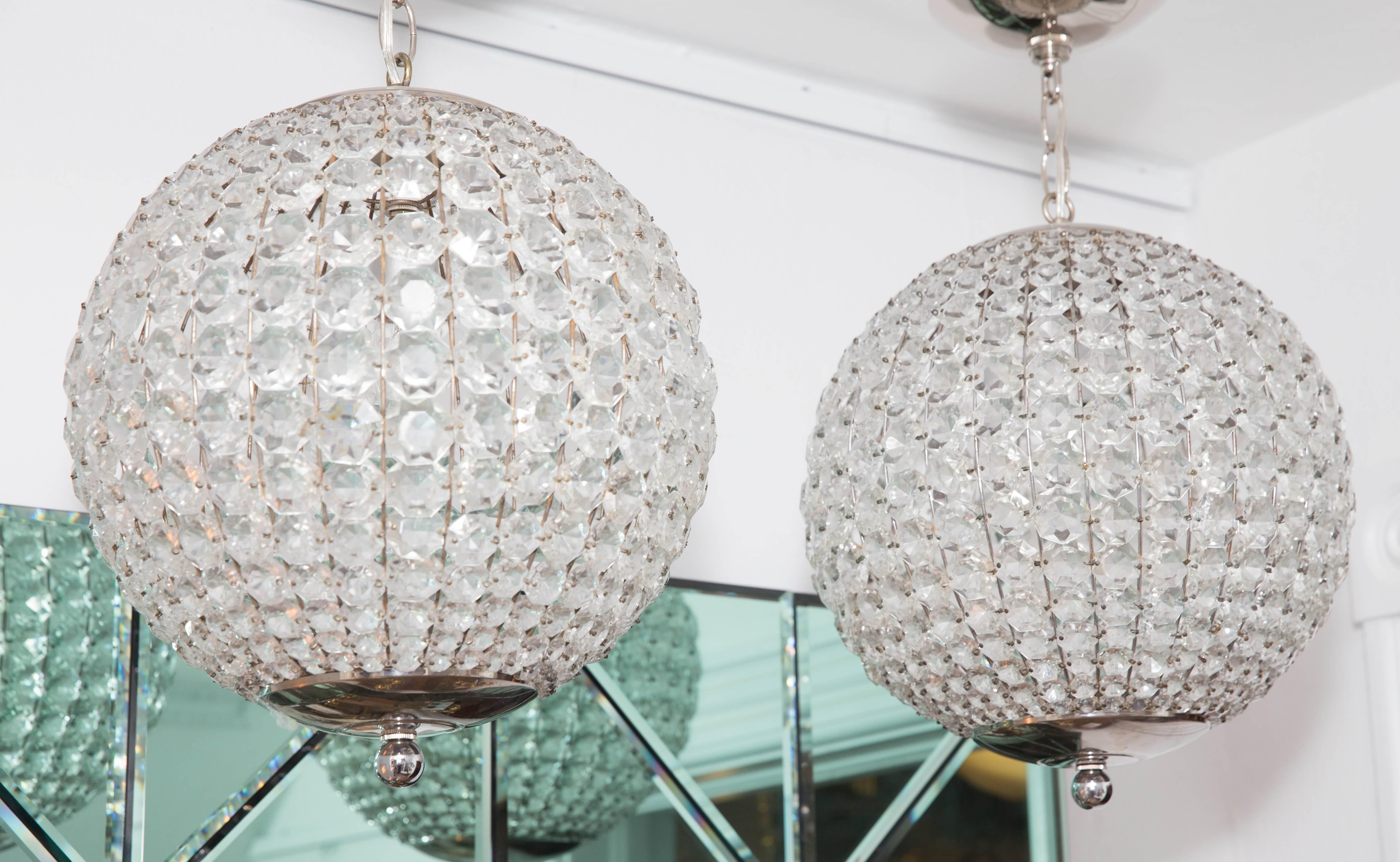 Spherical pendants composed of multiple faceted glass "Jewel" elements with chrome detail.