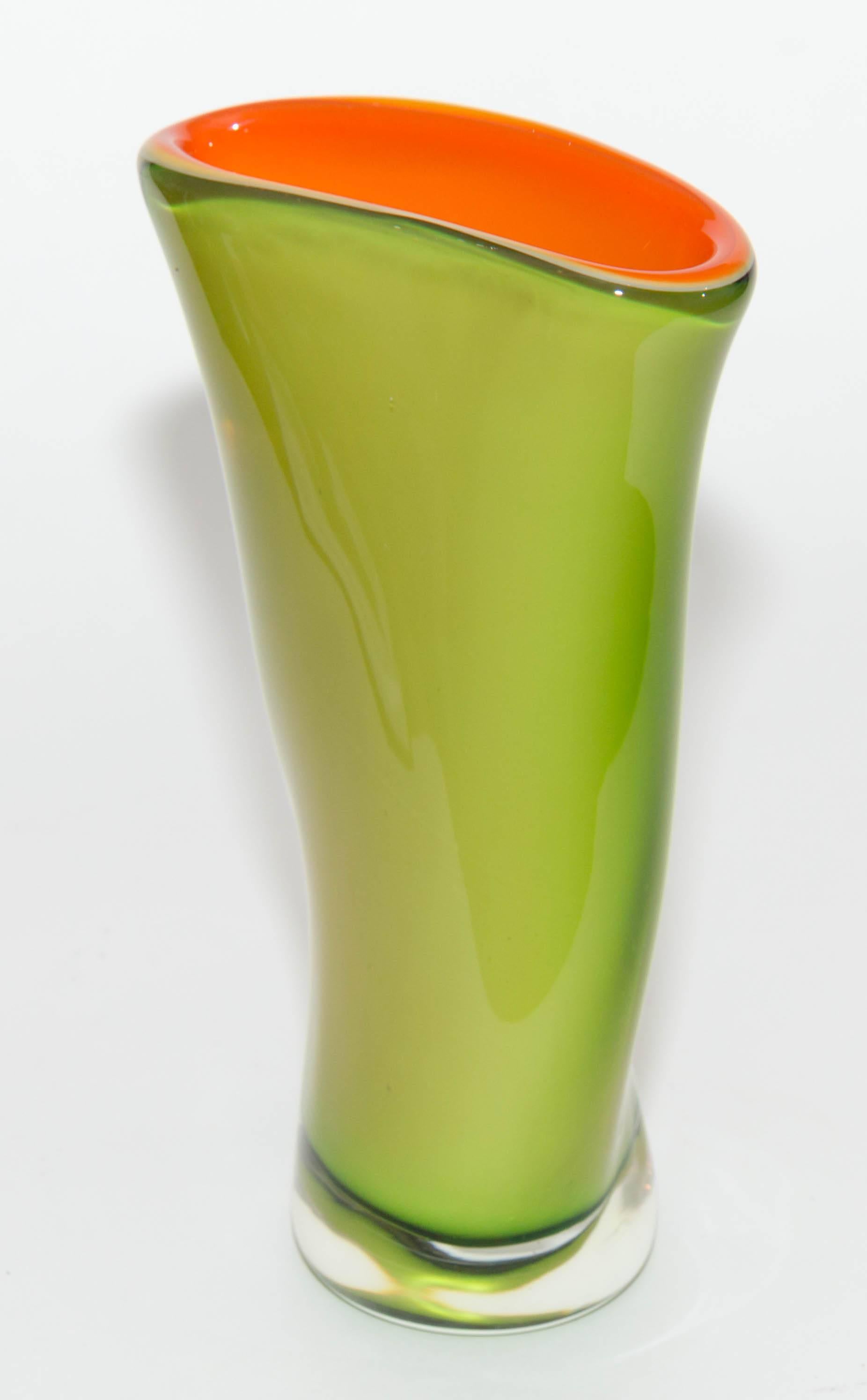 Green and orange asymmetrical Murano glass vase.
