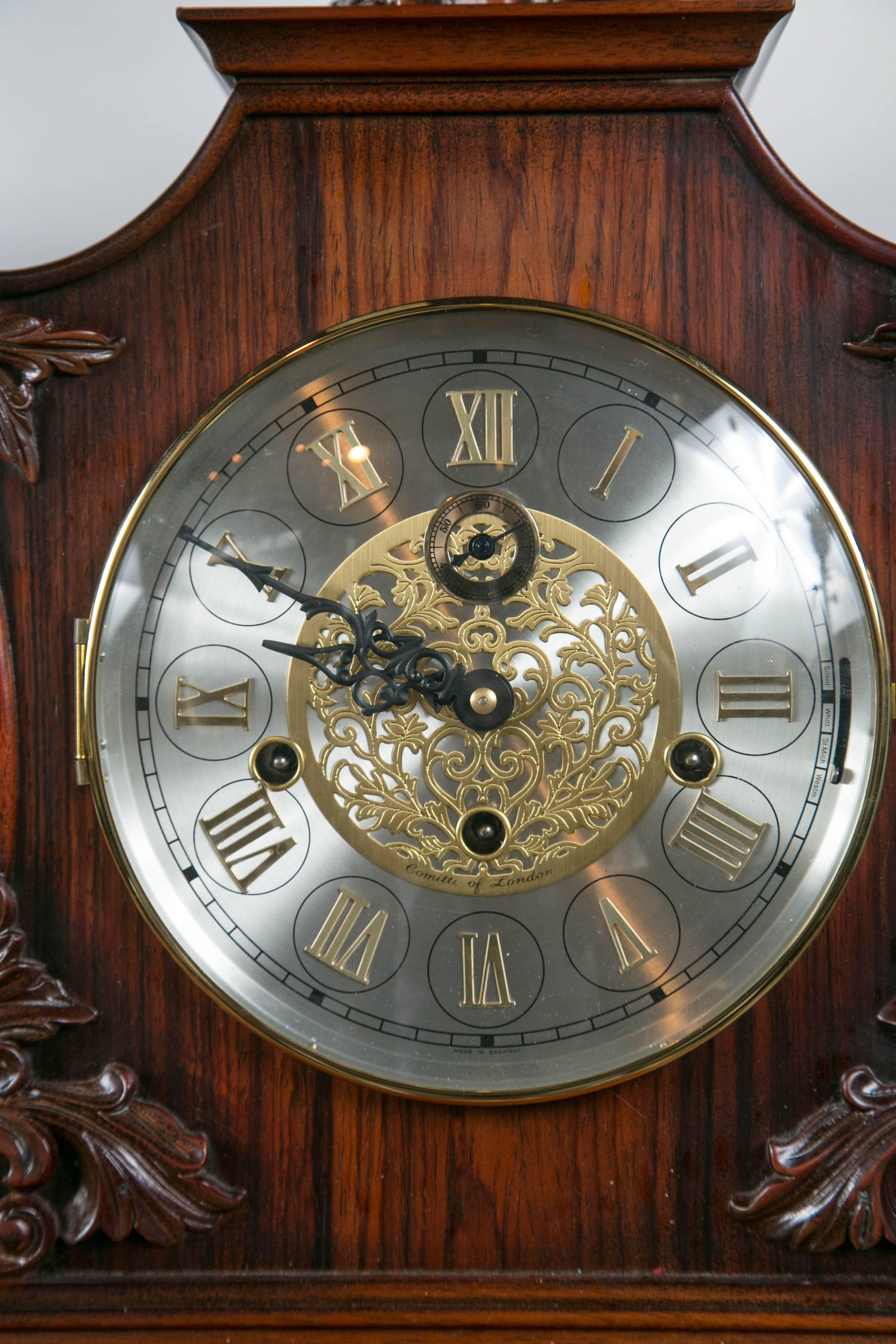 Carved Mahogany and Rosewood Case Mantel Clock