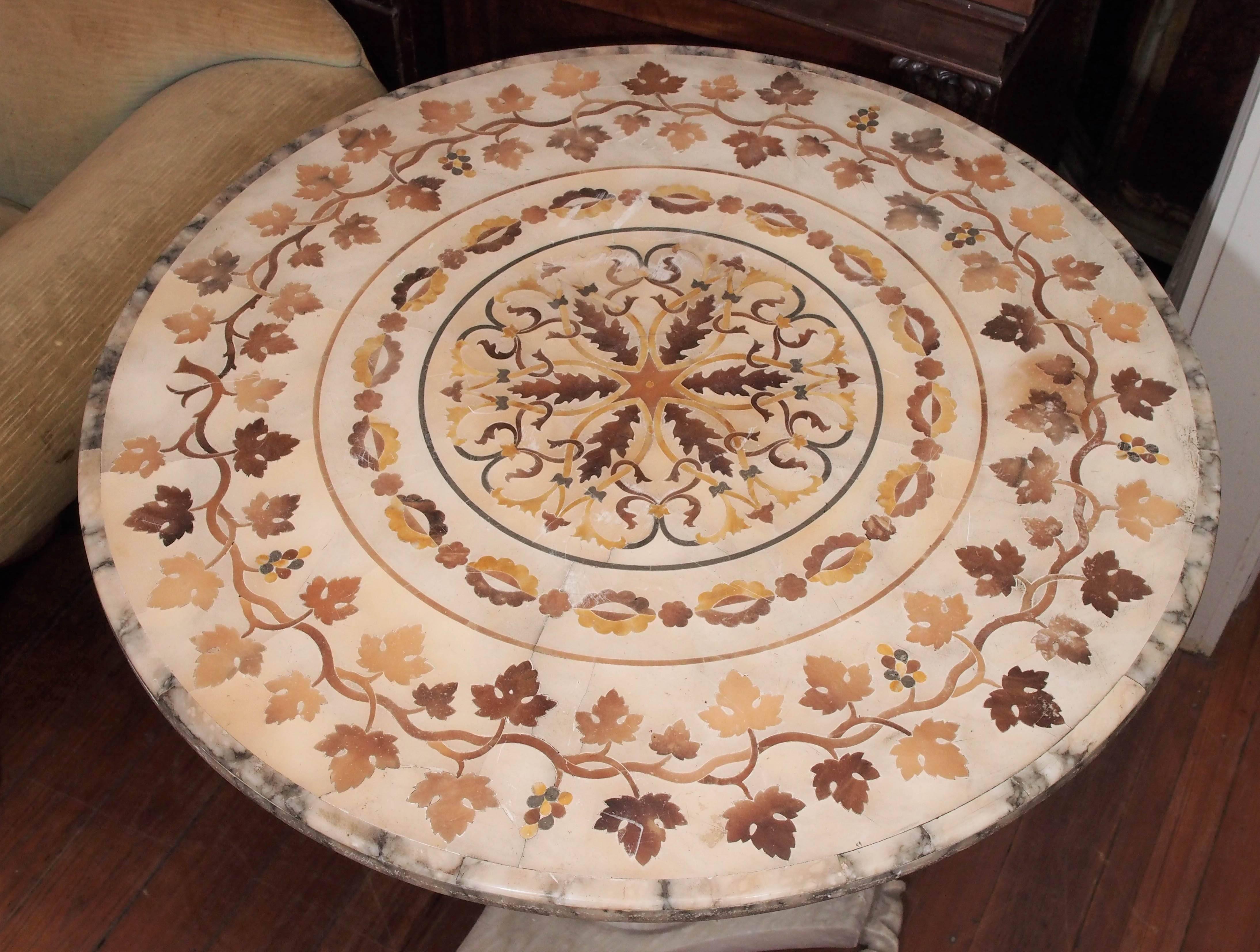 Italian pietra dura centre table with unusual coloration of white, cream and light browns.