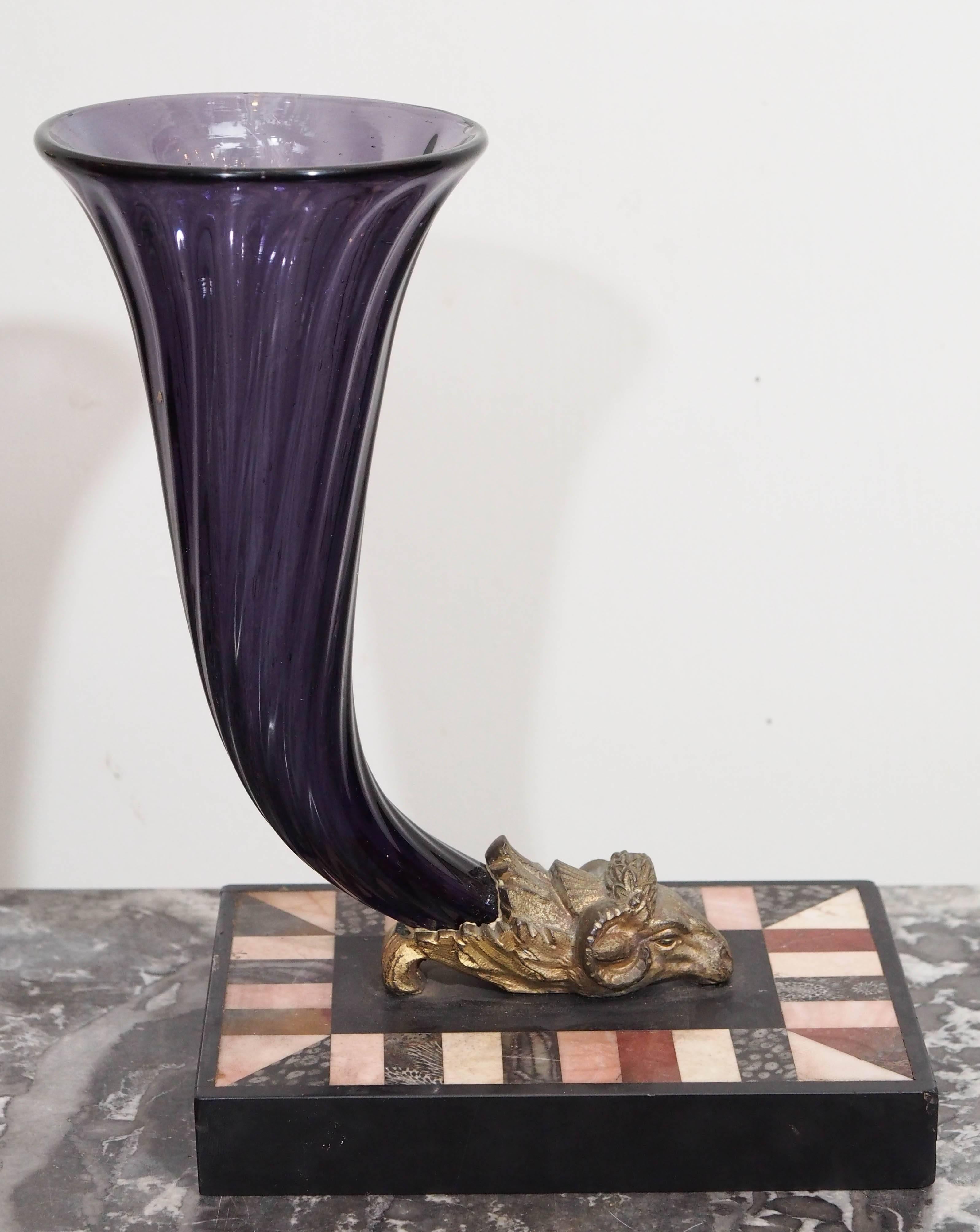 Pair of amethyst glass cornucopia vase with bronze rams on specimen bases.