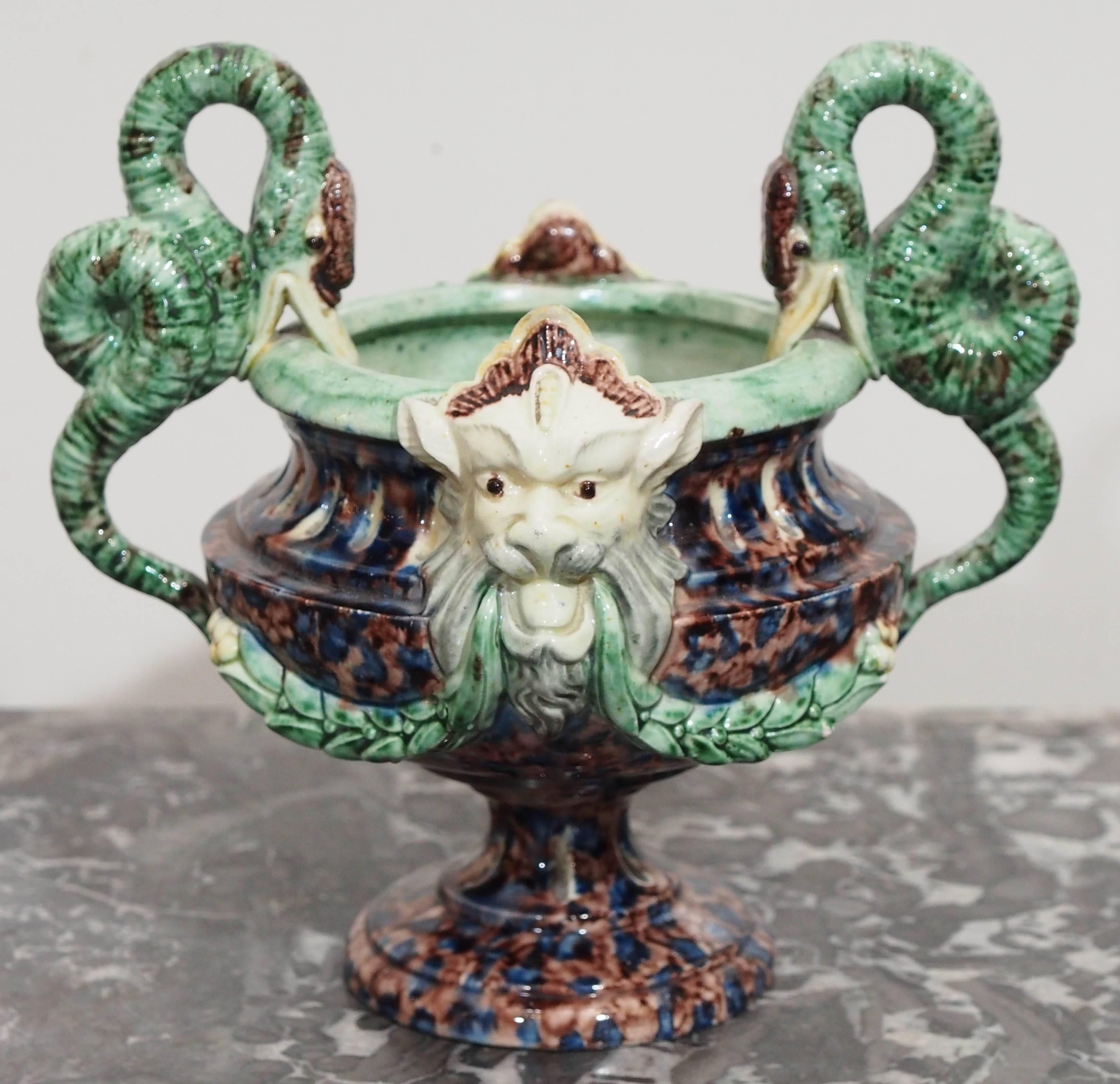French Majolica cachepots in urn form.