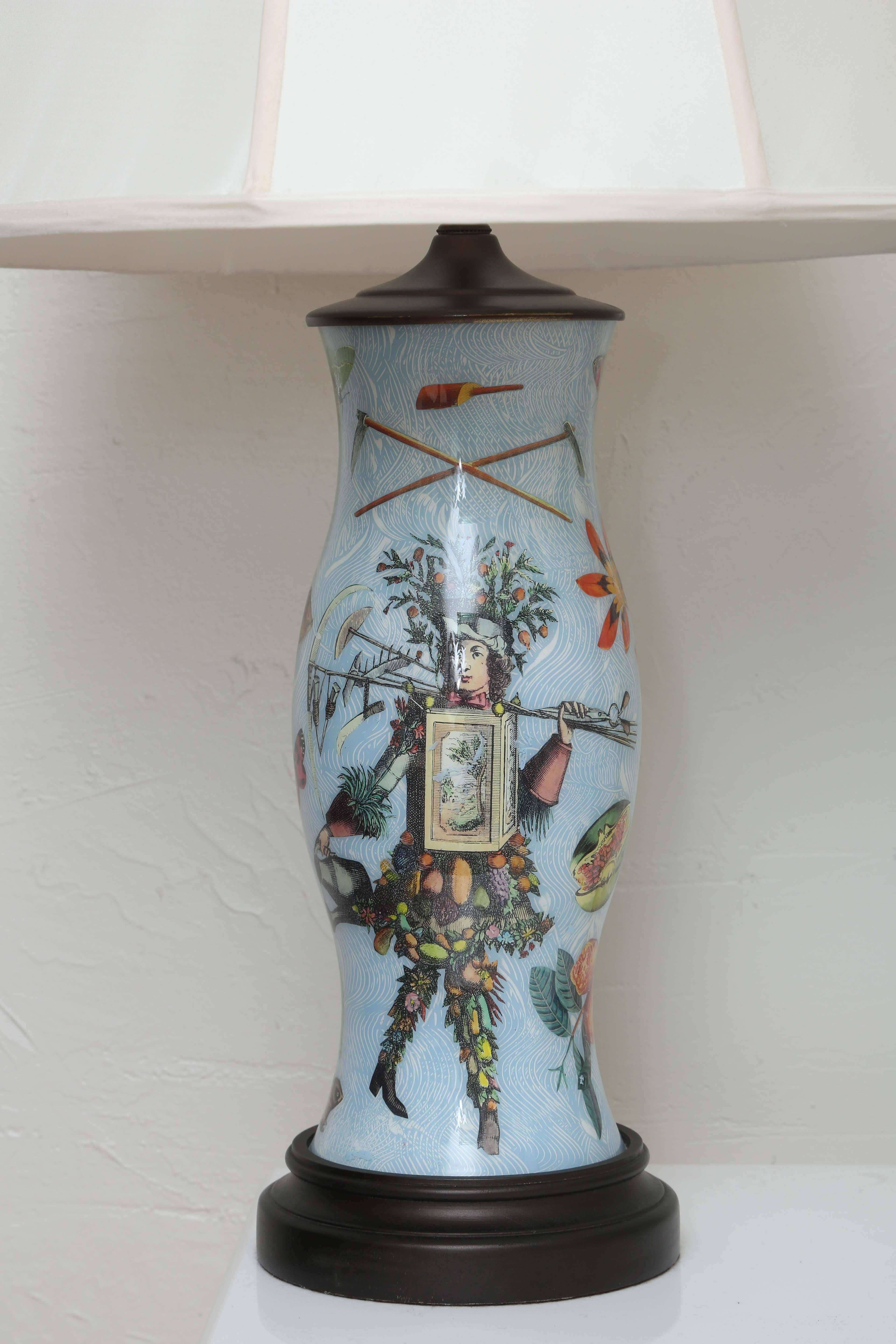 Stunning pair of baby blue decoupage lamps with very colorful and whimsical designs. Custom handmade silk shades.