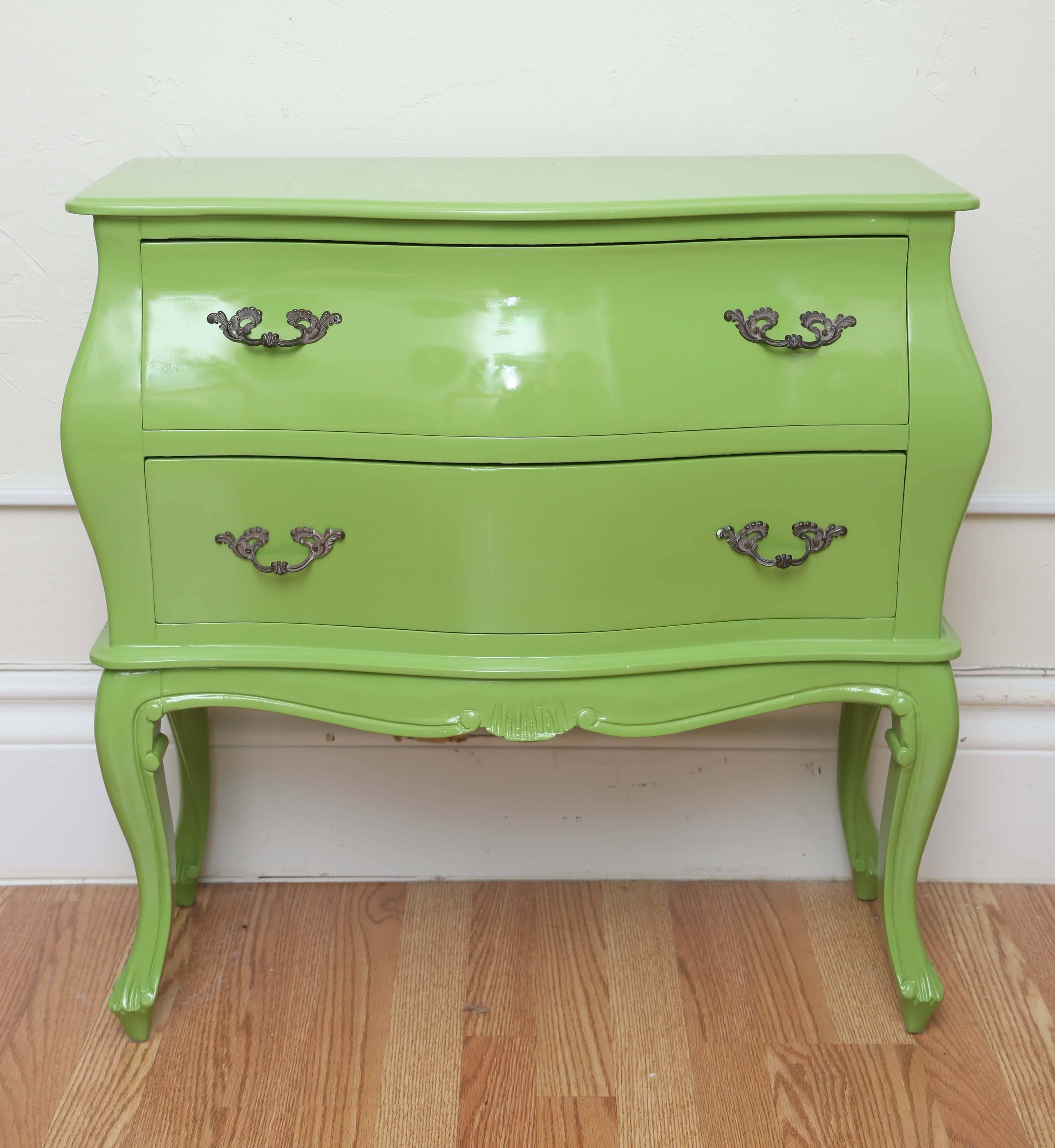 Striking lime green lacquered two-drawer commode.