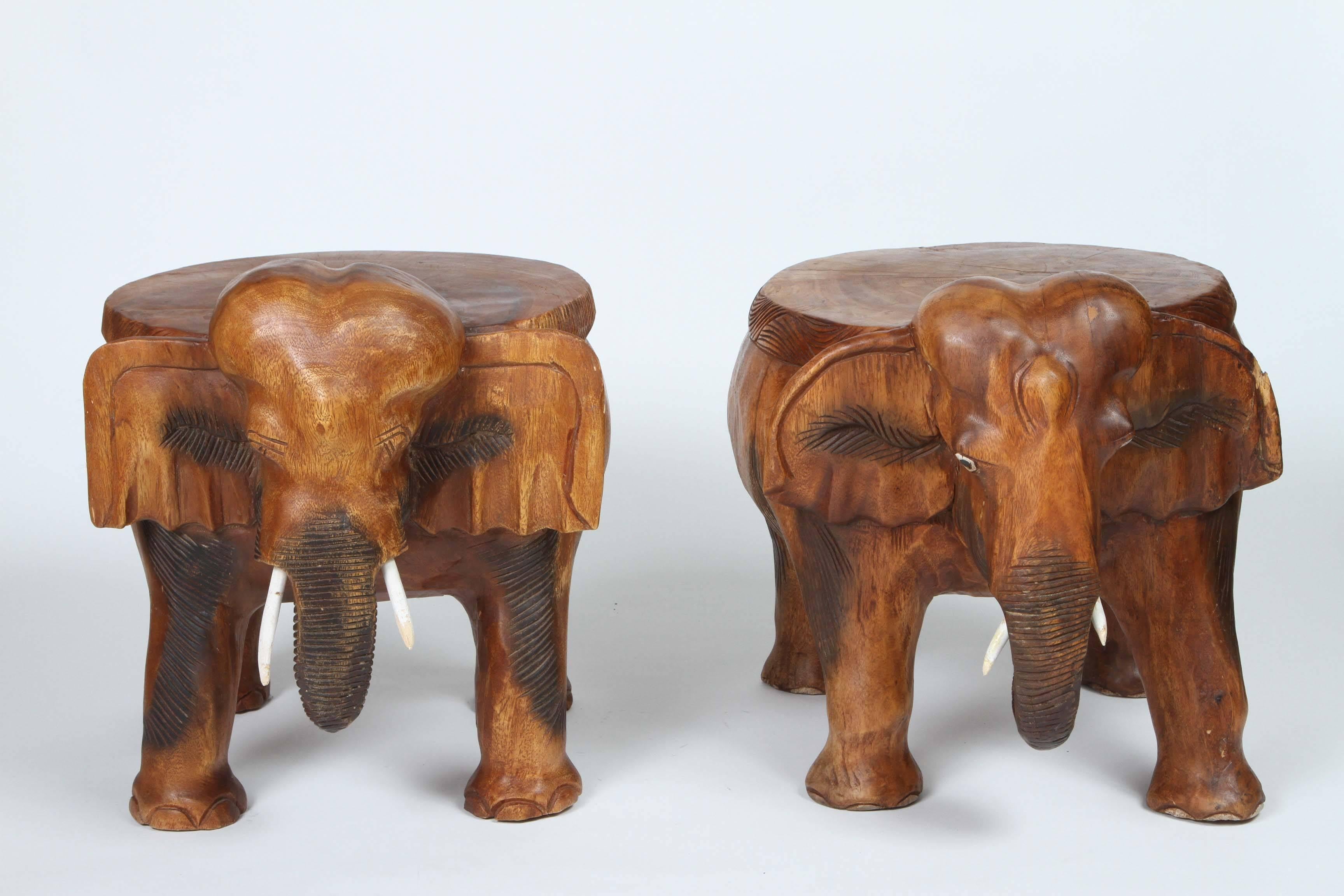 Pair of vintage carved wood elephant stools or tables.