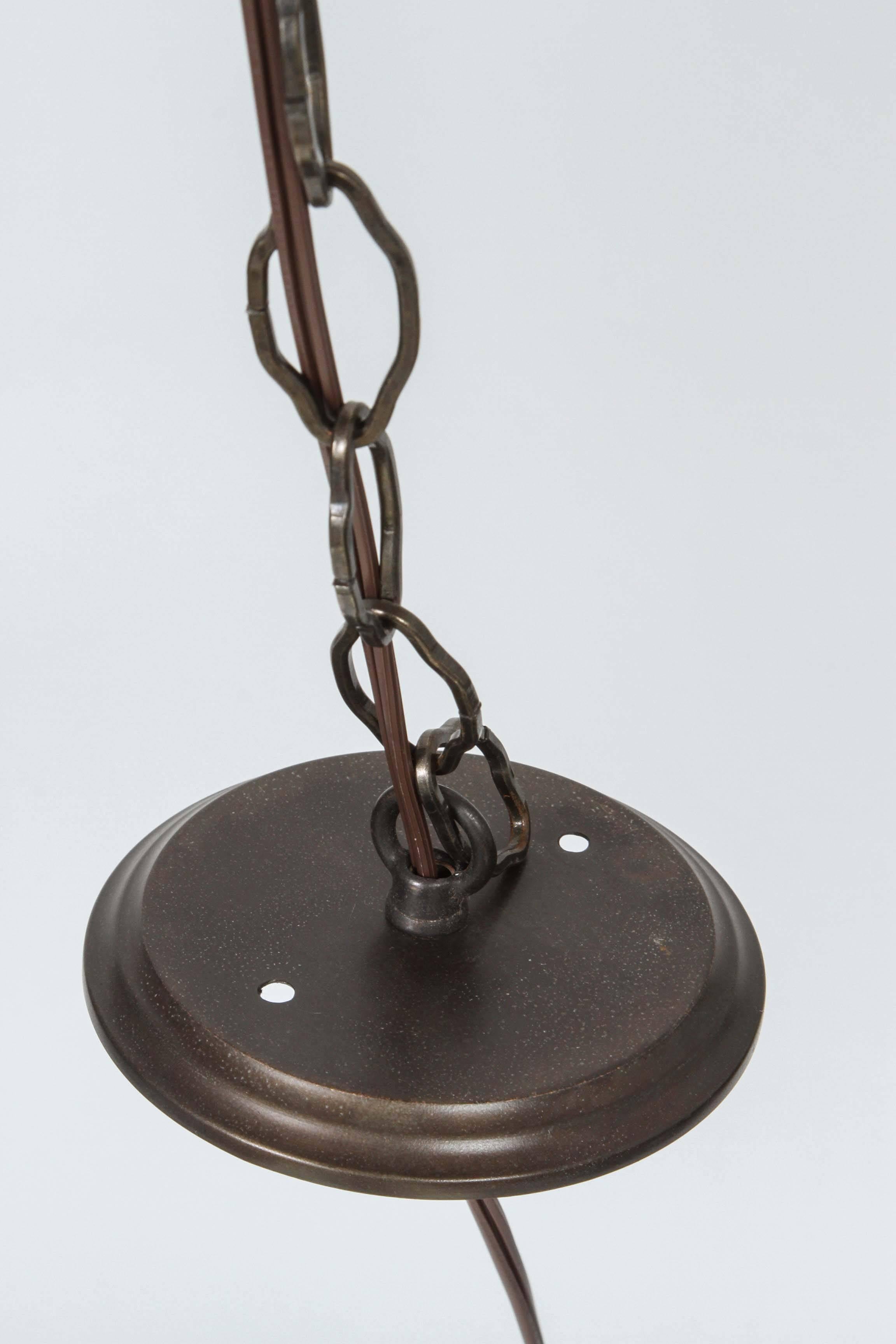 Mid-20th Century Art Deco Caged Milk Glass and Iron Pendant Light