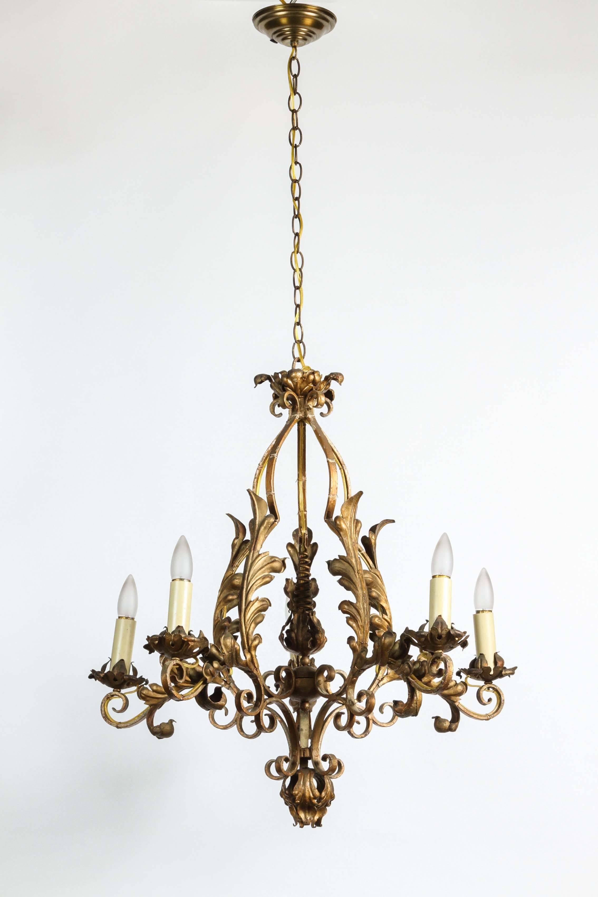 1940s aged gold look with wrought iron decorative leaves and five lights. Re-wired. This can be seen at 1800 South 18th Grand Ave location in Downtown Los Angeles.