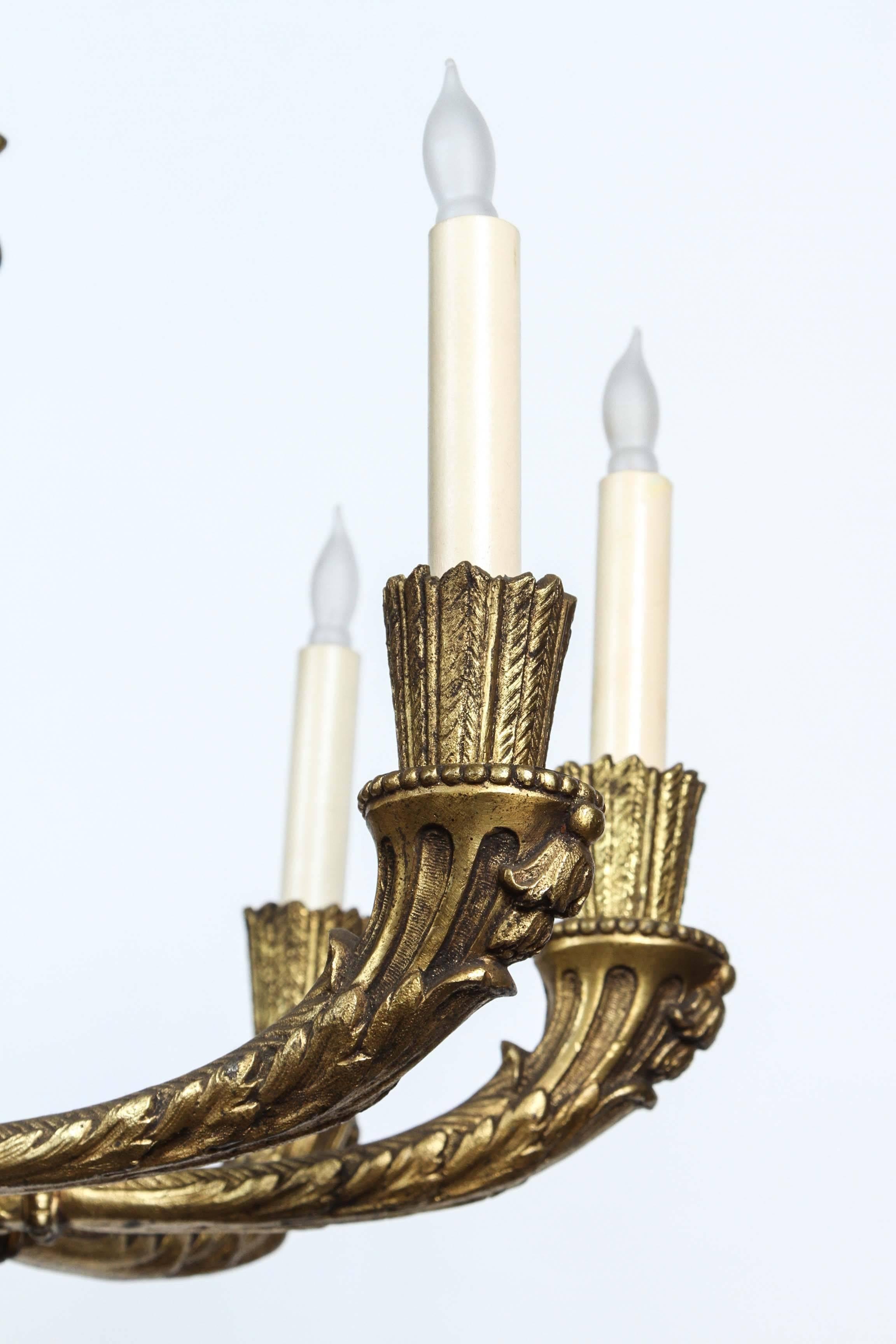 1920s, Bronze Eight-Light Chandelier with Four Grotesques from France 3