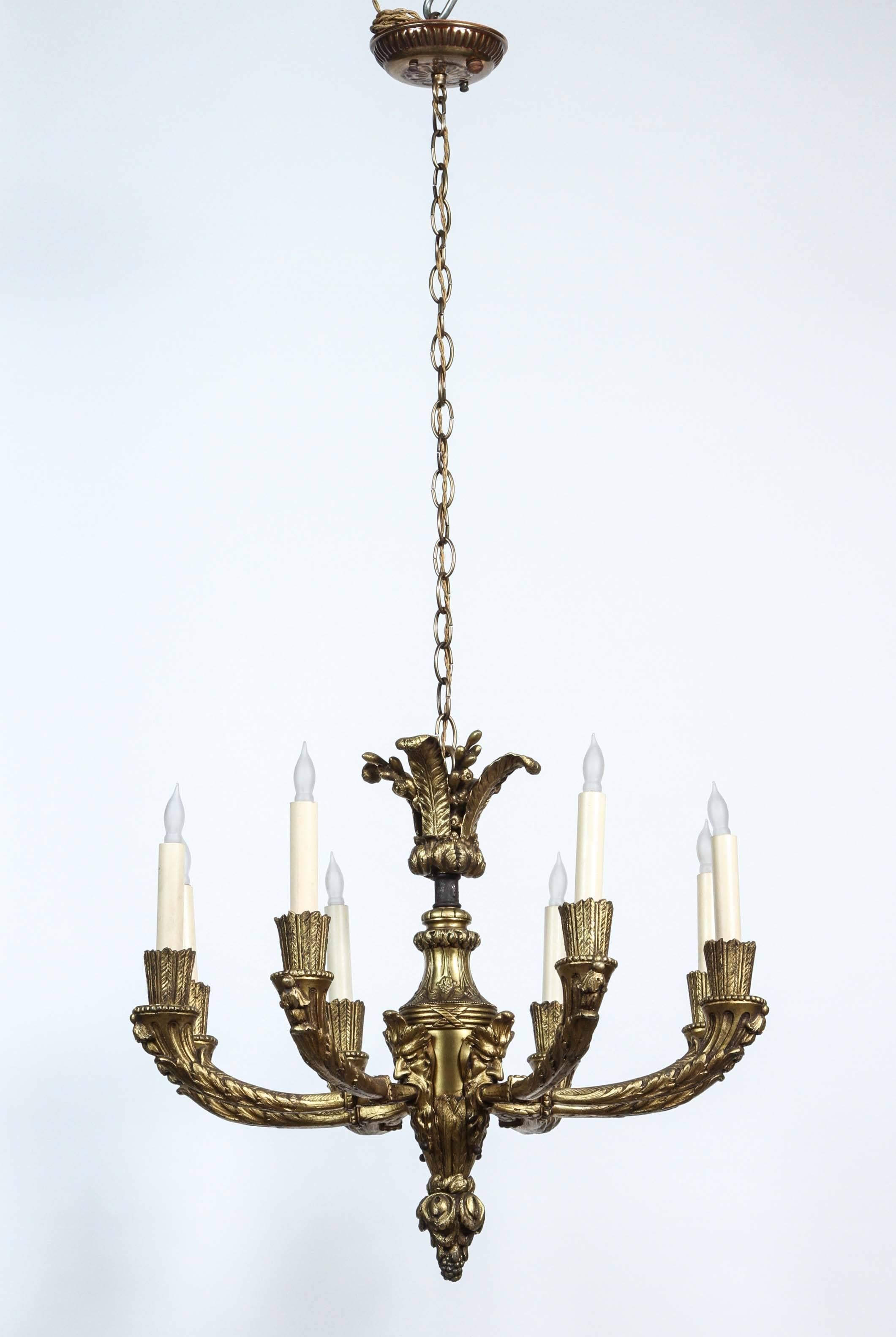 1920s, Bronze Eight-Light Chandelier with Four Grotesques from France 4