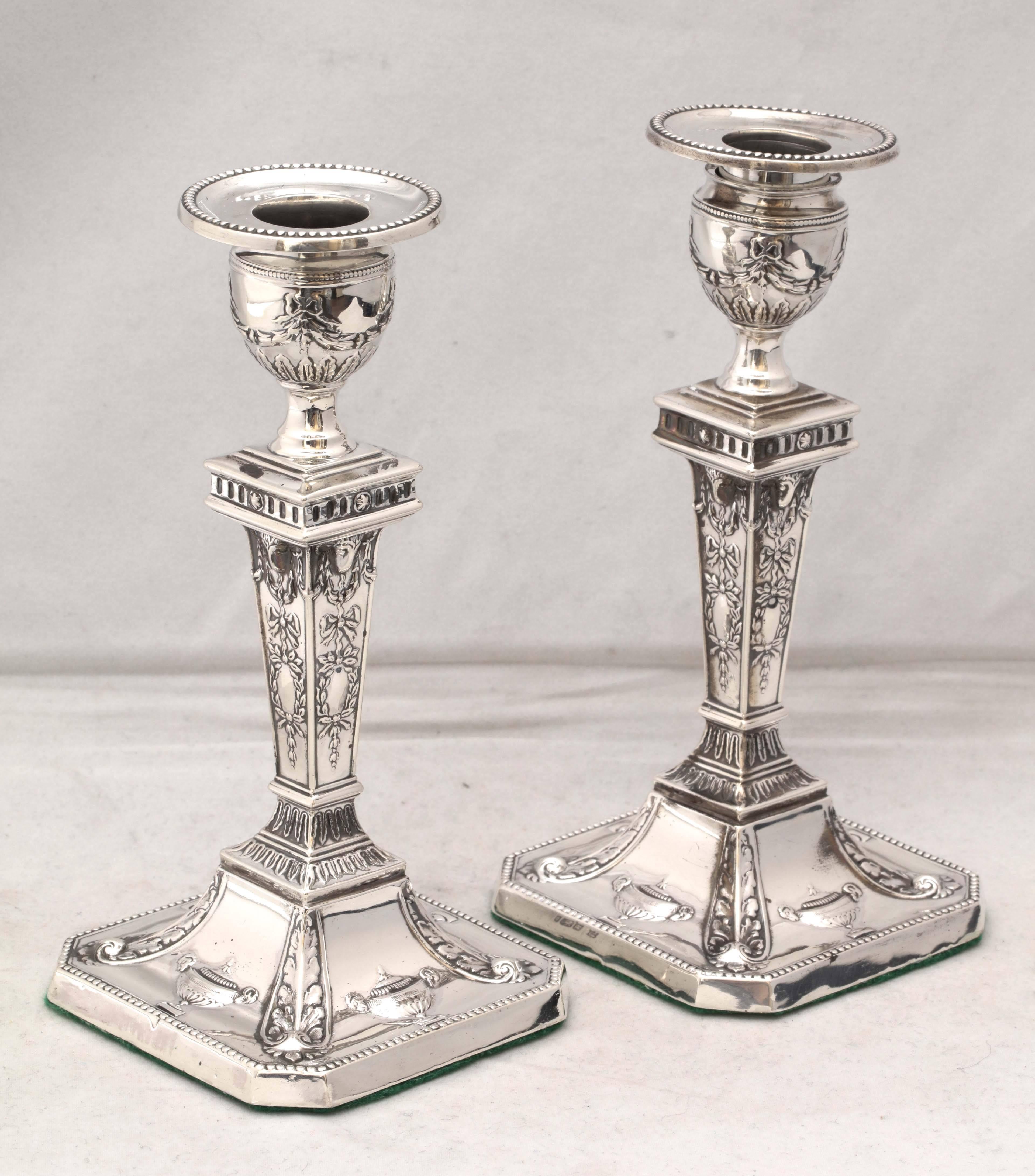 Early 20th Century Pair of Edwardian Sterling Silver Adams Style Candlesticks