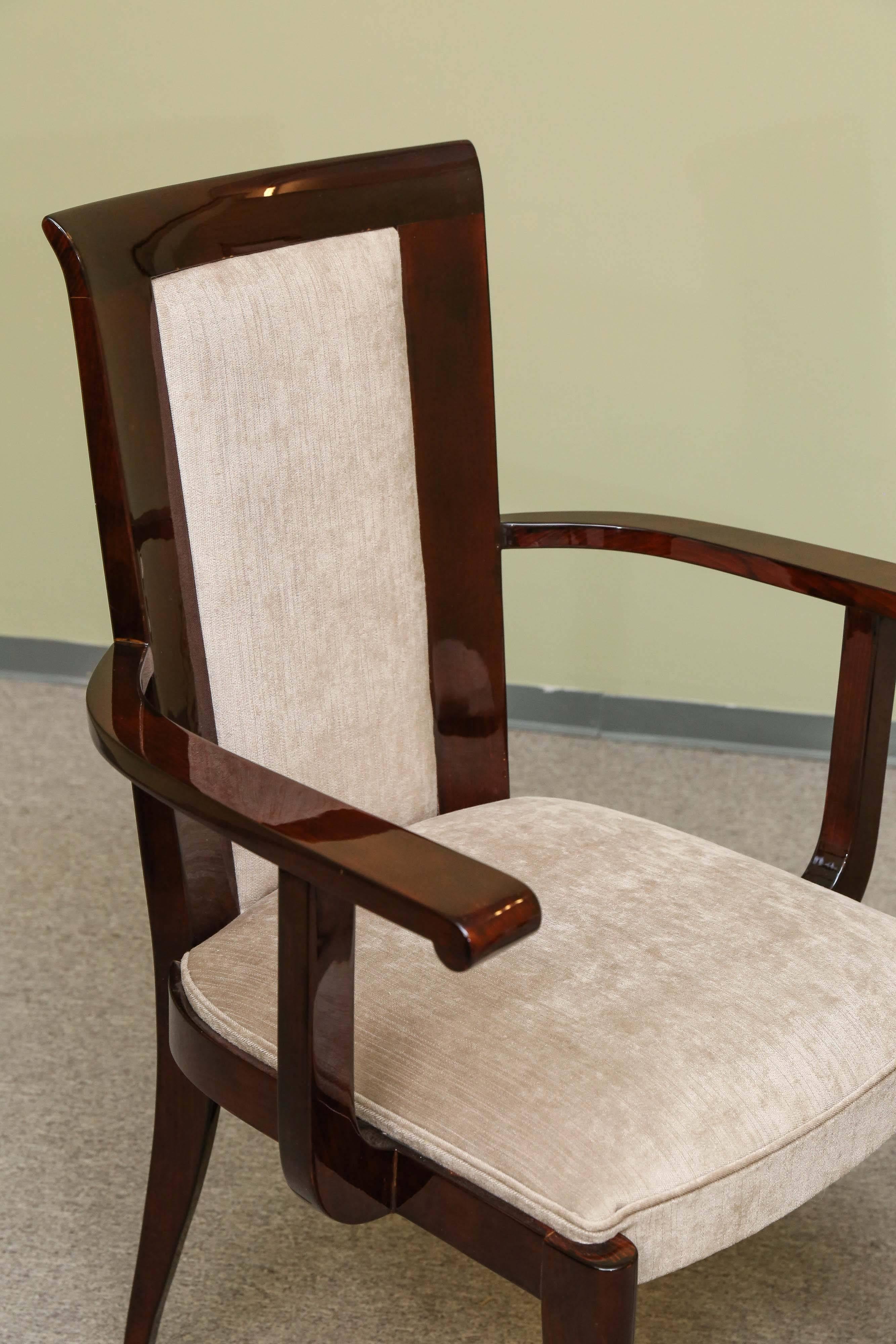 Set of ten chairs has 8 regular and two armchairs. They made out of high quality beechwood and re-upholstered in light beige velvety fabric. The chair is elevated by four slim rectangular legs.
Condition is perfect.
Could be sold