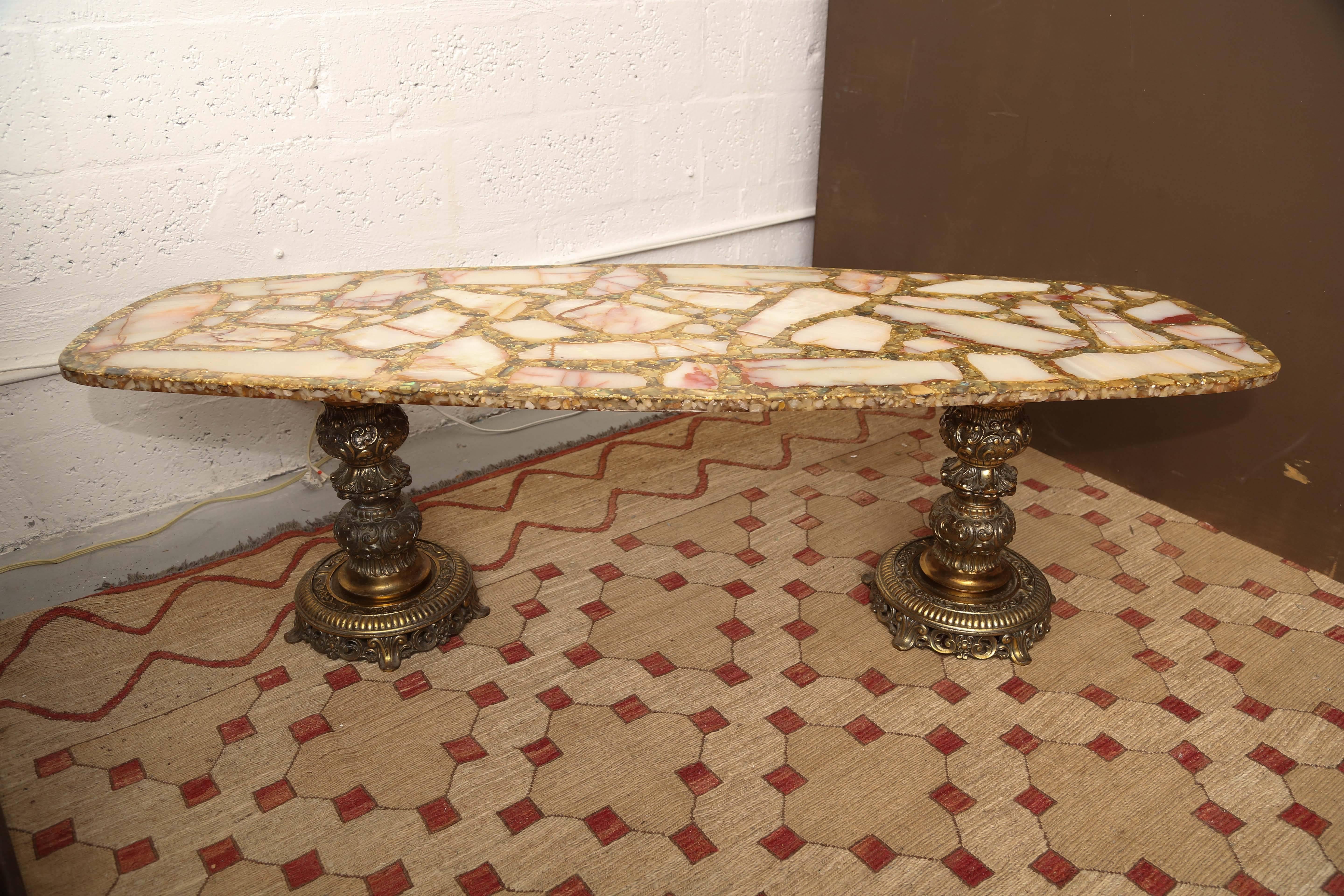Gorgeous mosaic coffee table made from Italian onyx, gold leaf and brass.