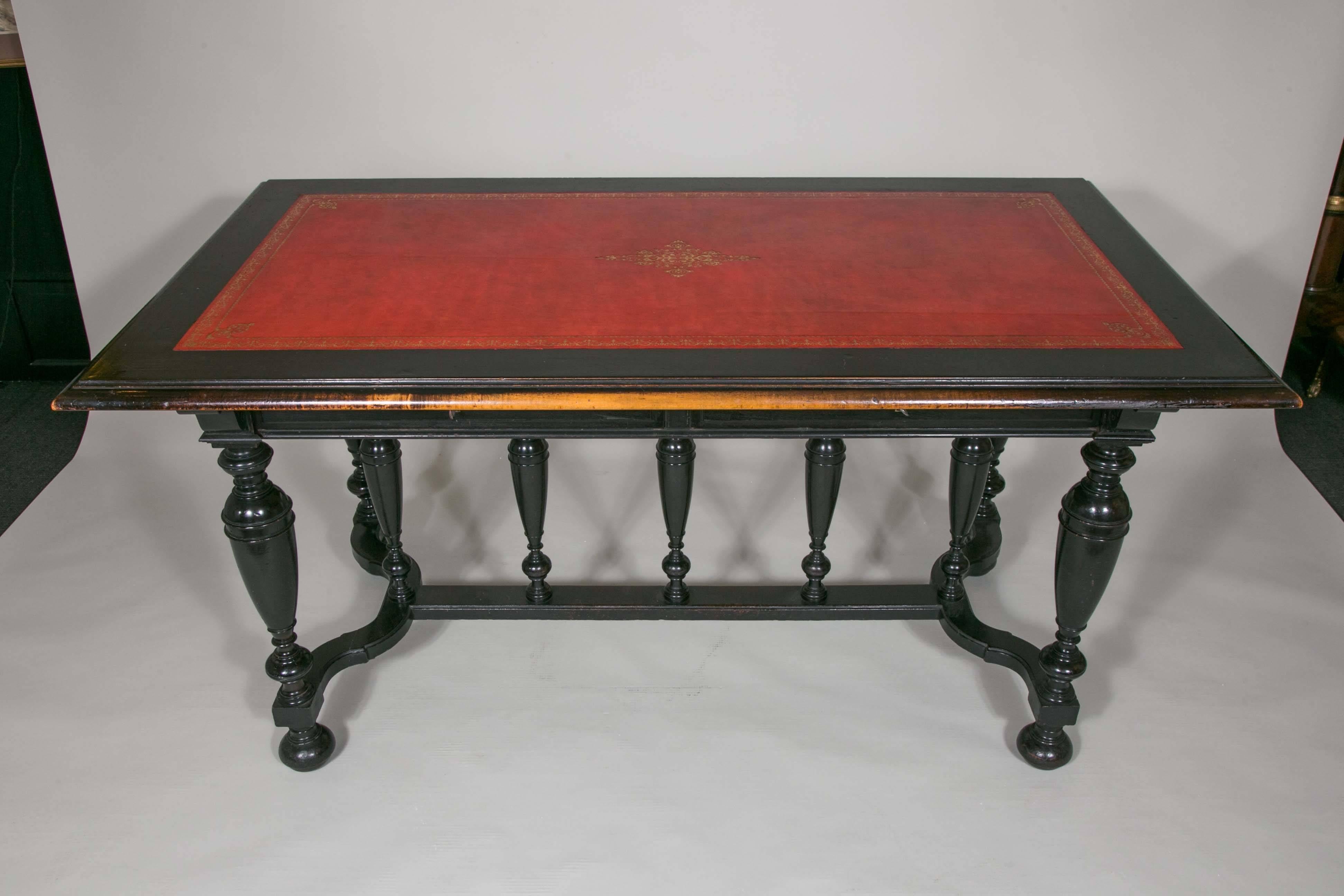 Desk in ebonized wood, two centre drawers with a red leather insert. Napoleon III, 19th century.
   