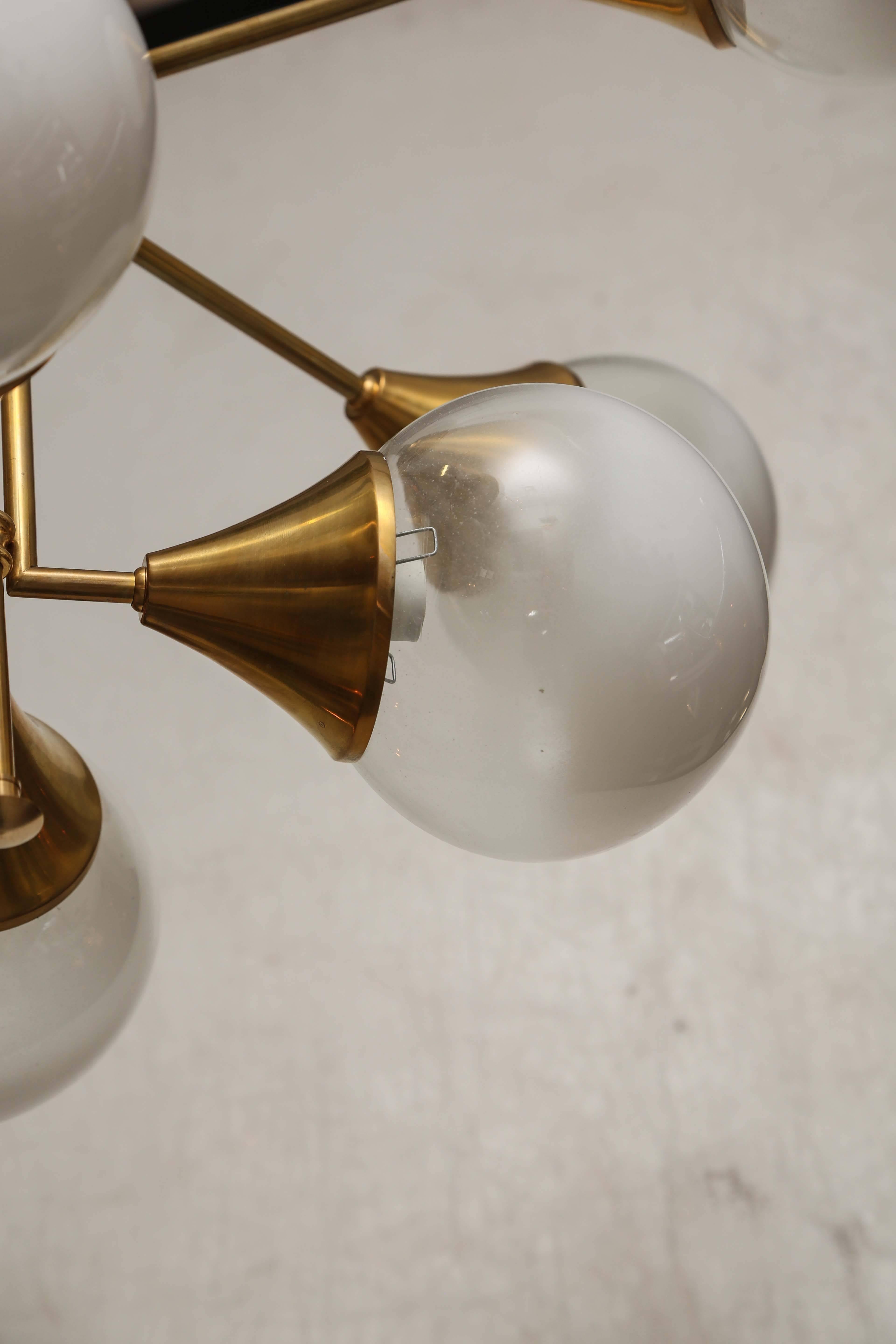 Retro Brass and Satin Glass Ball Chandelier In Good Condition For Sale In West Palm Beach, FL