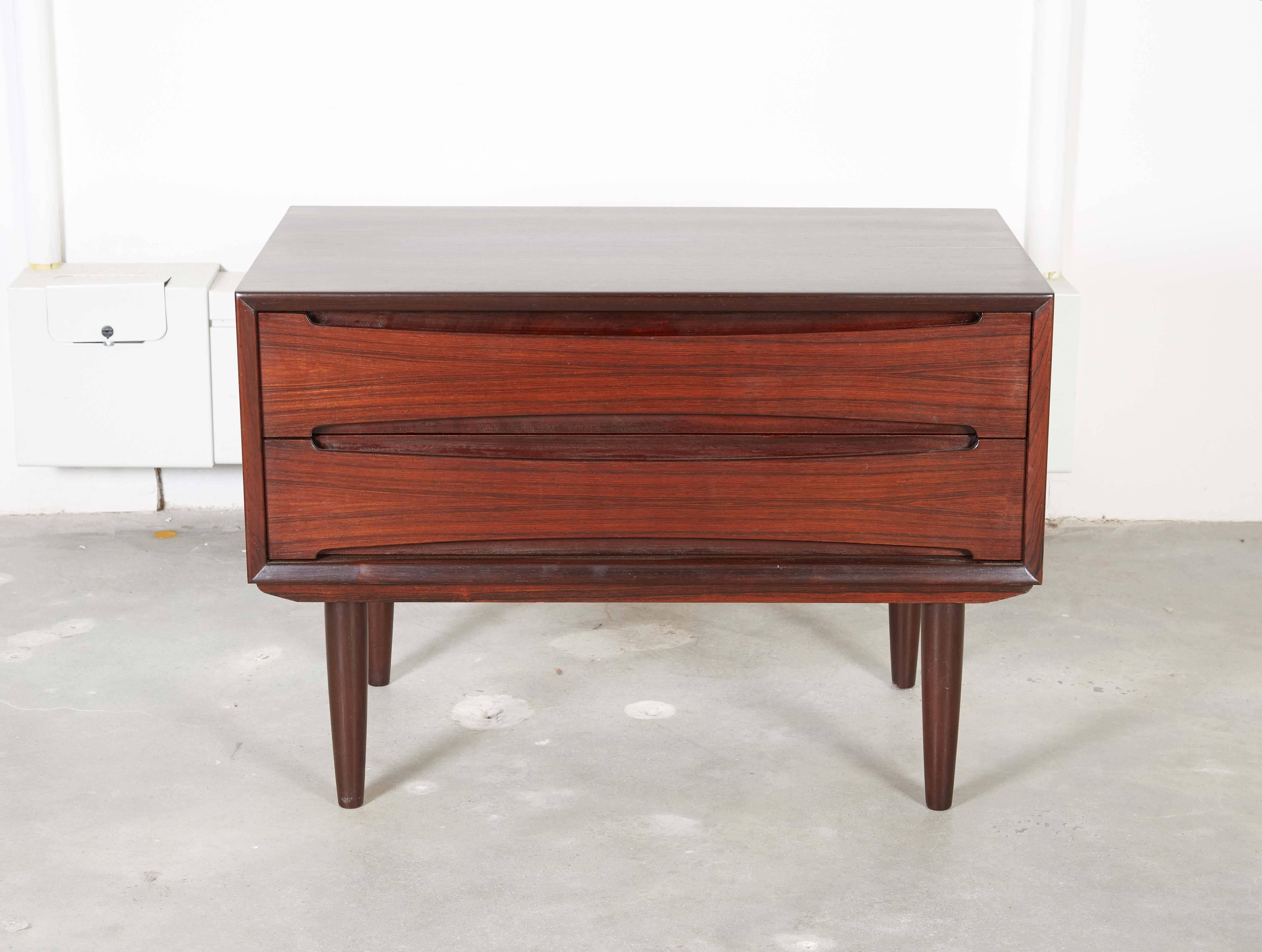 Mid Century Low Dresser

This rosewood dresser is absolutely stunning. Beautiful from any angle. Heftier / bigger than a night stand smaller than a dresser. Great for an end table to a large sofa or at the end of the bed as a bench. Ready for pick