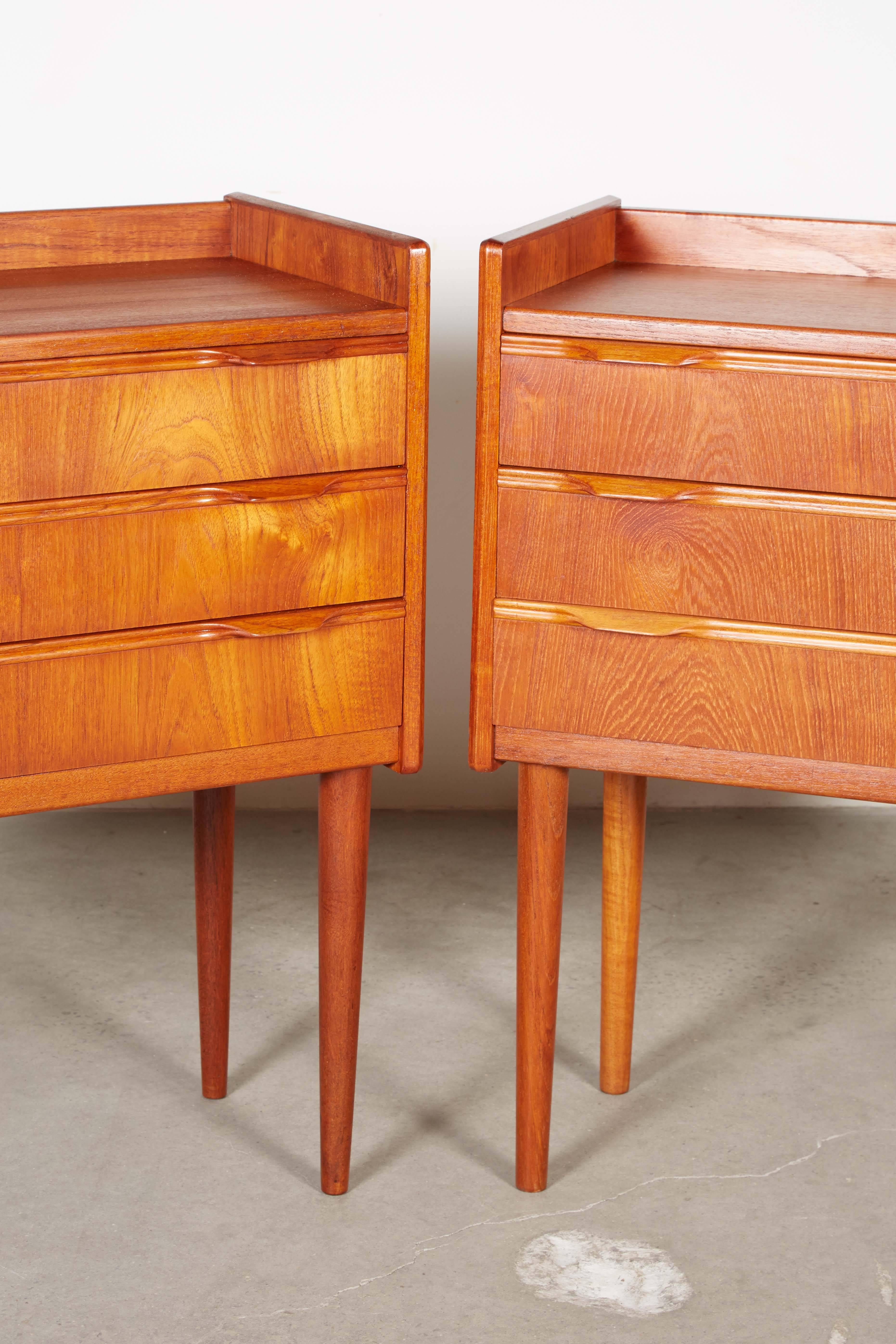 Mid Century 1960s Teak Nightstands with 3 Drawers

This pair of vintage bedside tables are in excellent condition. Great for storage in any part of the home. Ready for pick up, delivery, or shipping anywhere in the world. 