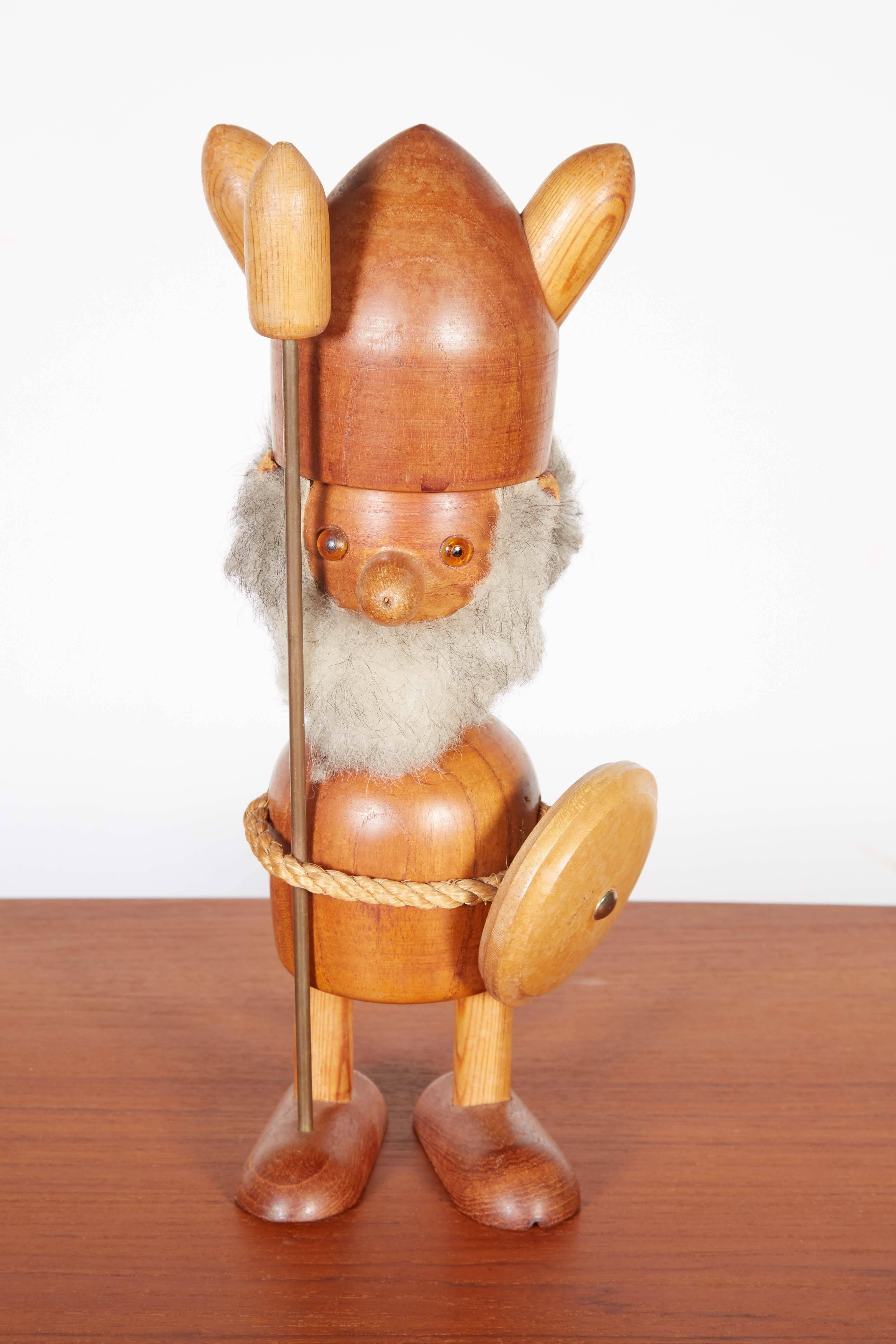 Vintage 1950s Large Wooden Teak Viking by Hans Bolling

This Danish Teak Viking is in excellent condition except for a small amount of wear on the leather ears. Very rare in this size. Ready for pick up, or Shipping anywhere in the world.