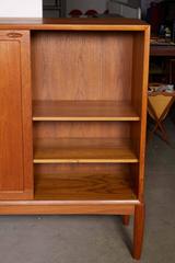 Danish Teak Cabinet with Sliding Doors by H.W. Klein
